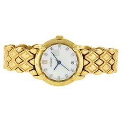 Reloj Chaumet Elysees de señora, fecha, cuarzo, oro de 18 quilates, MoP y esfera de diamantes
