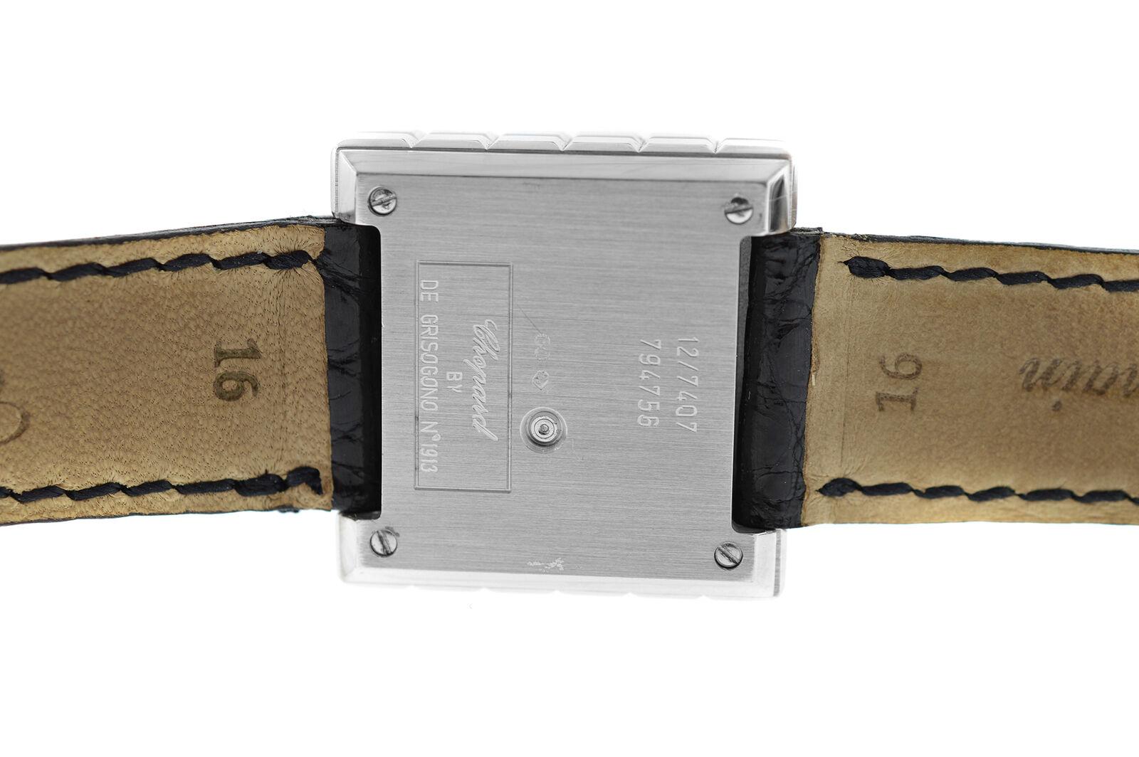 Brand	Chopard by De Grisogono
Model	Ice Cube by De Grisogono 127407
Gender	Ladies
Condition	Pre owned
Movement	Swiss Quartz
Case Material	18K White Gold
Bracelet / Strap Material	
Leather

Clasp / Buckle Material	
18K White Gold
Clasp