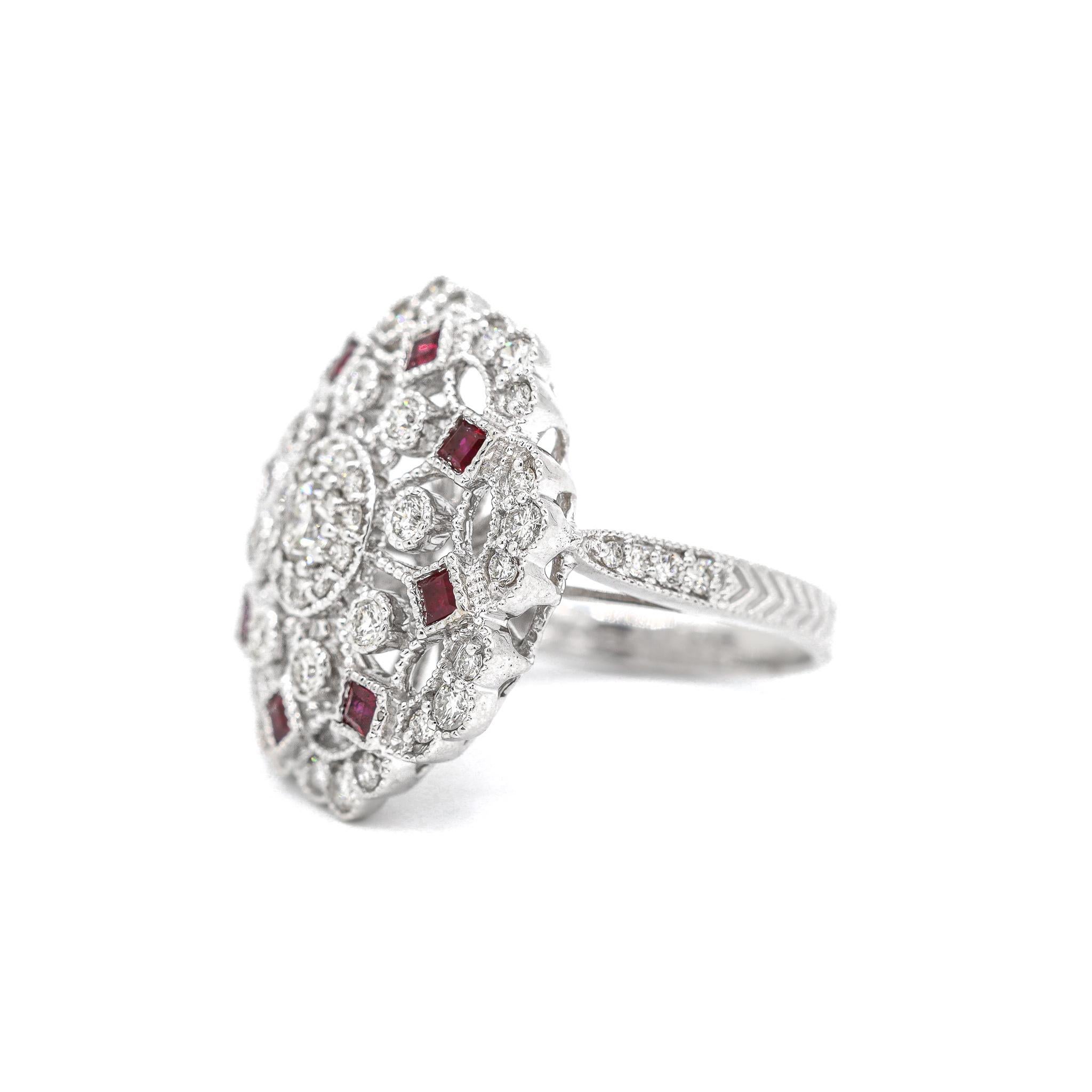 One lady's custom made polished, textured rhodium plated 14K white gold, diamond and ruby cluster, cocktail, fashion, vintage, halo ring with a half round shank. The ring is a size 7.25. The ring weighs a total of 9.20 grams., In new