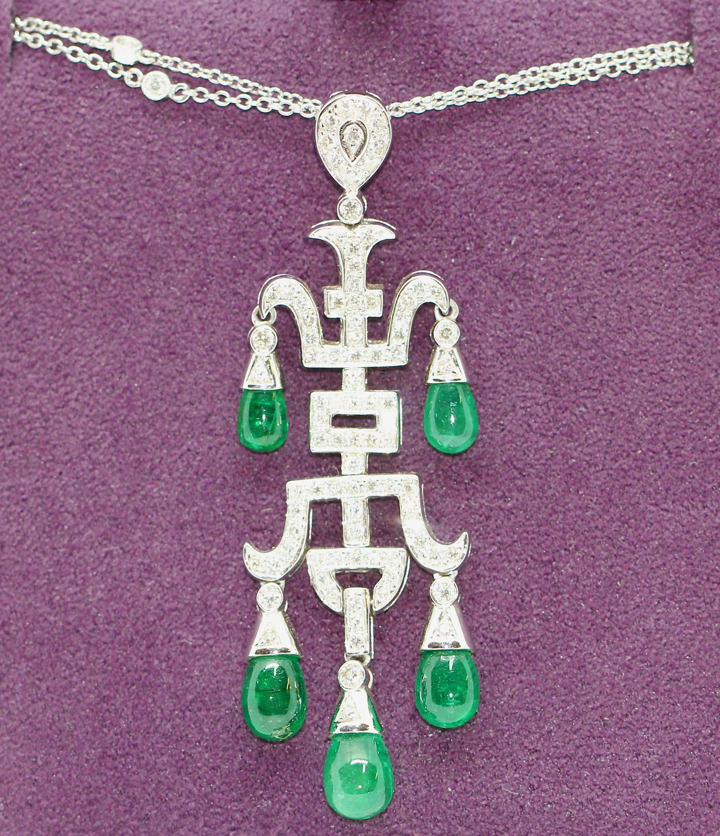 Ladies Diamond and Emerald Pendant, Necklace. 18 Karat White Gold

Set with 91 diamonds, total weight 0.93 ct.
(VS, H)

5 Emeralds Drop-Shaped

Including matching, two-row white gold chain with small diamonds.

Purest handcraft, from a renowned