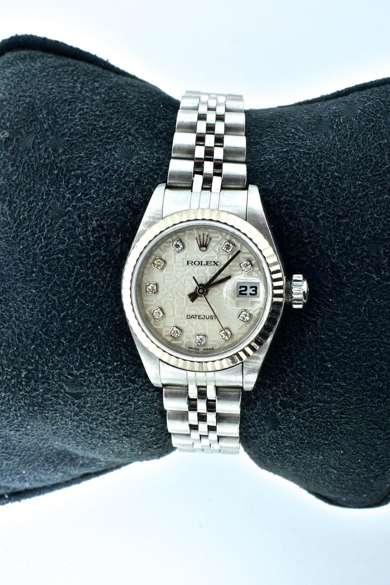 Rolex Vintage Ladies Rolex wrist watch - 100% authentic and guaranteed to be Rolex.  with the original fancy silver diamond jubilee dial,  date-just with sweep second hand.  Scratch resistant sapphire crystal with cyclops magnifier. In fine