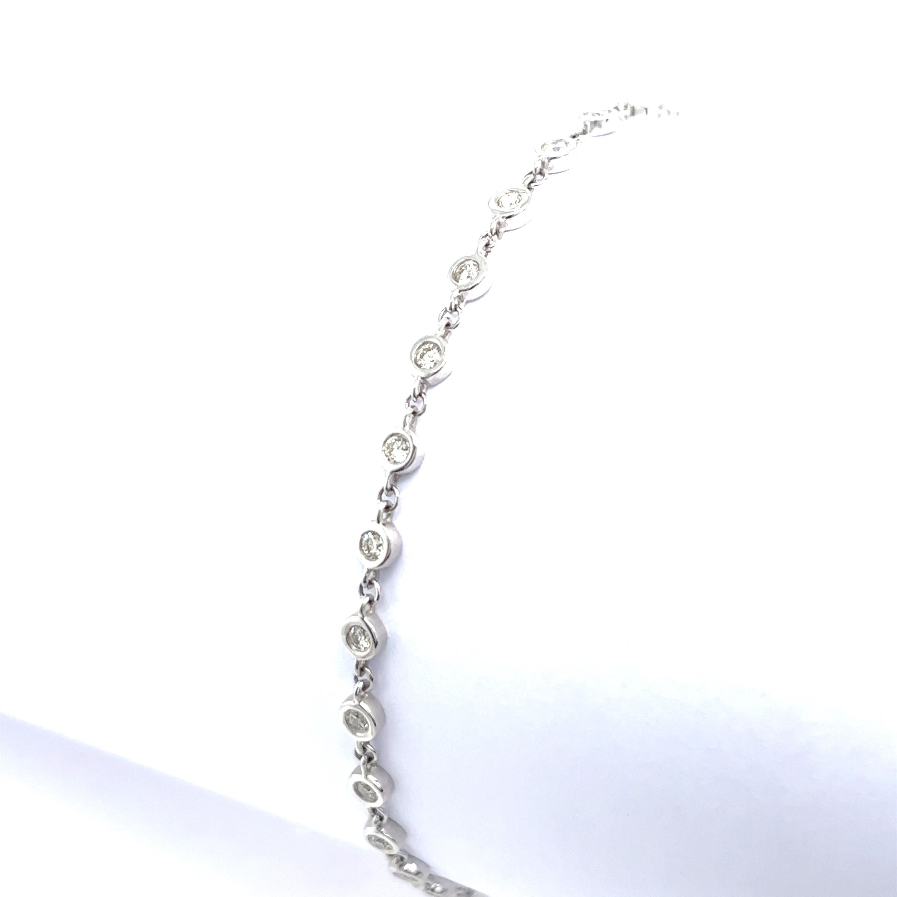 Ladies Diamond Rubover Bracelet Set with 29 Bezel Diamonds in 18ct White Gold In New Condition For Sale In London, GB