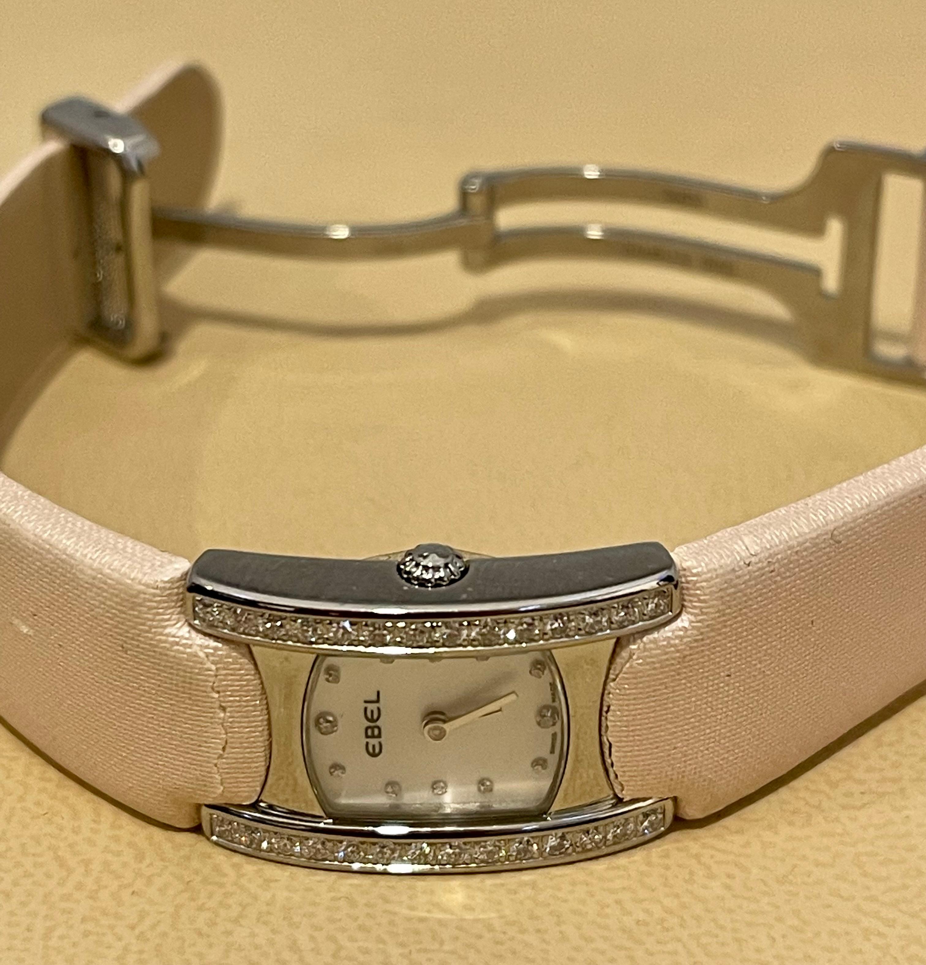 Pre owned
Ebel Beluga Ladies Watch. Stainless steel 19mm case with diamonds. Mother of pearl dial with diamonds. Pink leather strap with a stainless steel deployment buckle. Quartz battery movement.
Leather Belt 
42554980
Swiss made
Belt has little