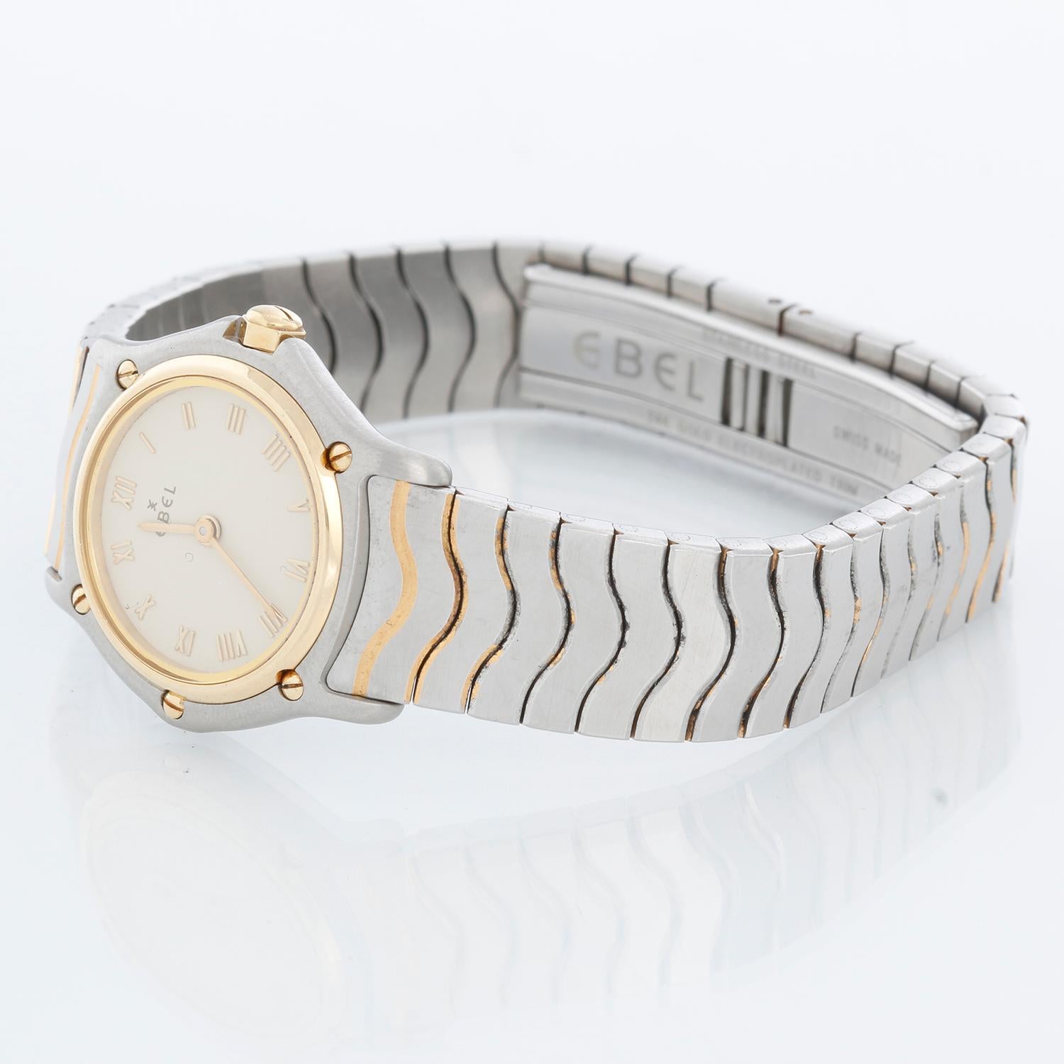 Ladies Ebel Sport Classique Steel & 18k Gold 23mm White Dial Quartz - quartz movement. Stainless steel and 18k yellow gold (23 mm ) . White dial with Roman numerals . Stainless steel and 18k yellow gold bracelet; will fit a 6 inch wrist . Pre-owned