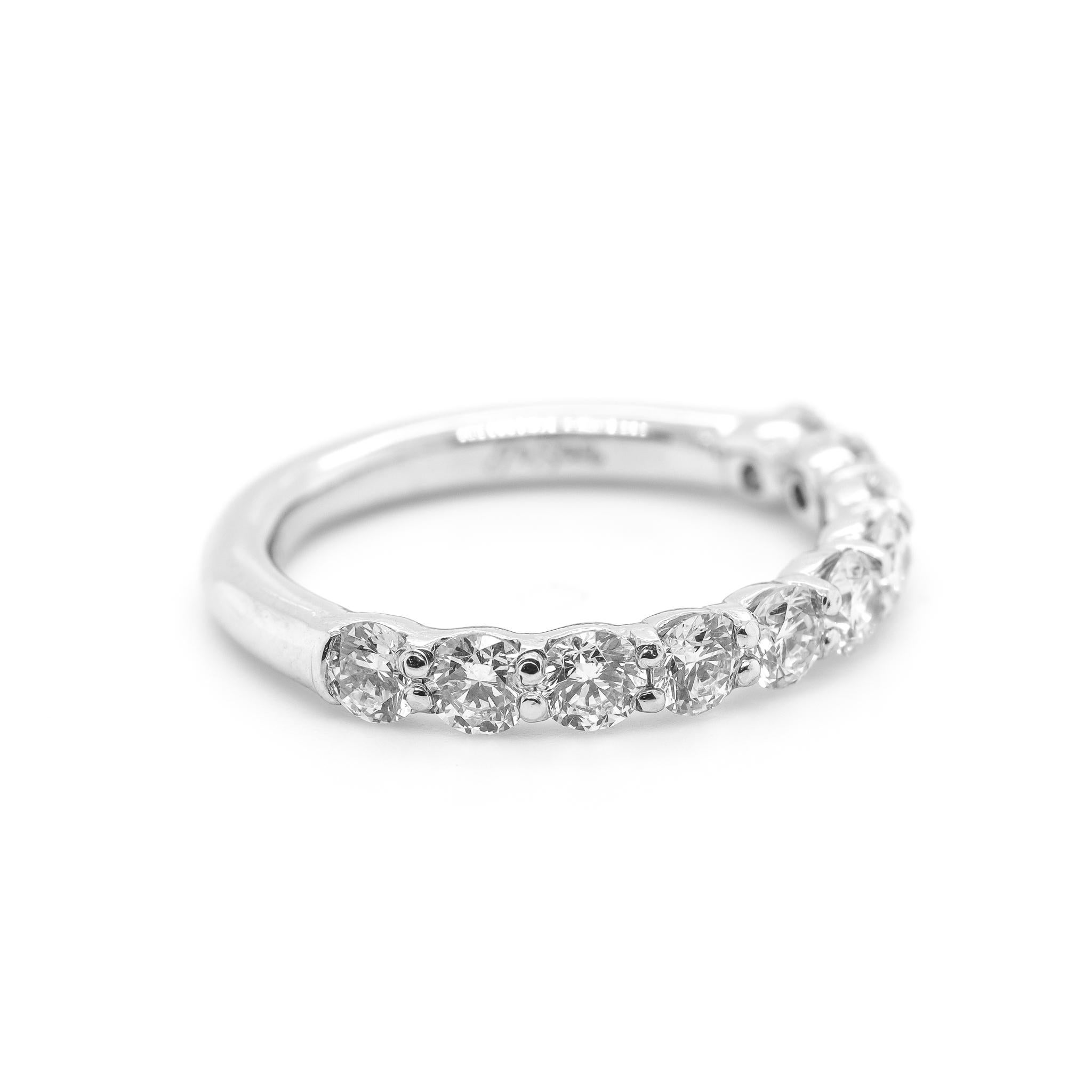 Gender: Ladies

Size: 5

Width: 3.00 mm

Weight: 4.40 grams

One lady's custom made polished 900 platinum ten-across, diamond wedding, semi-eternity band with a half-round shank.  Engraved with 