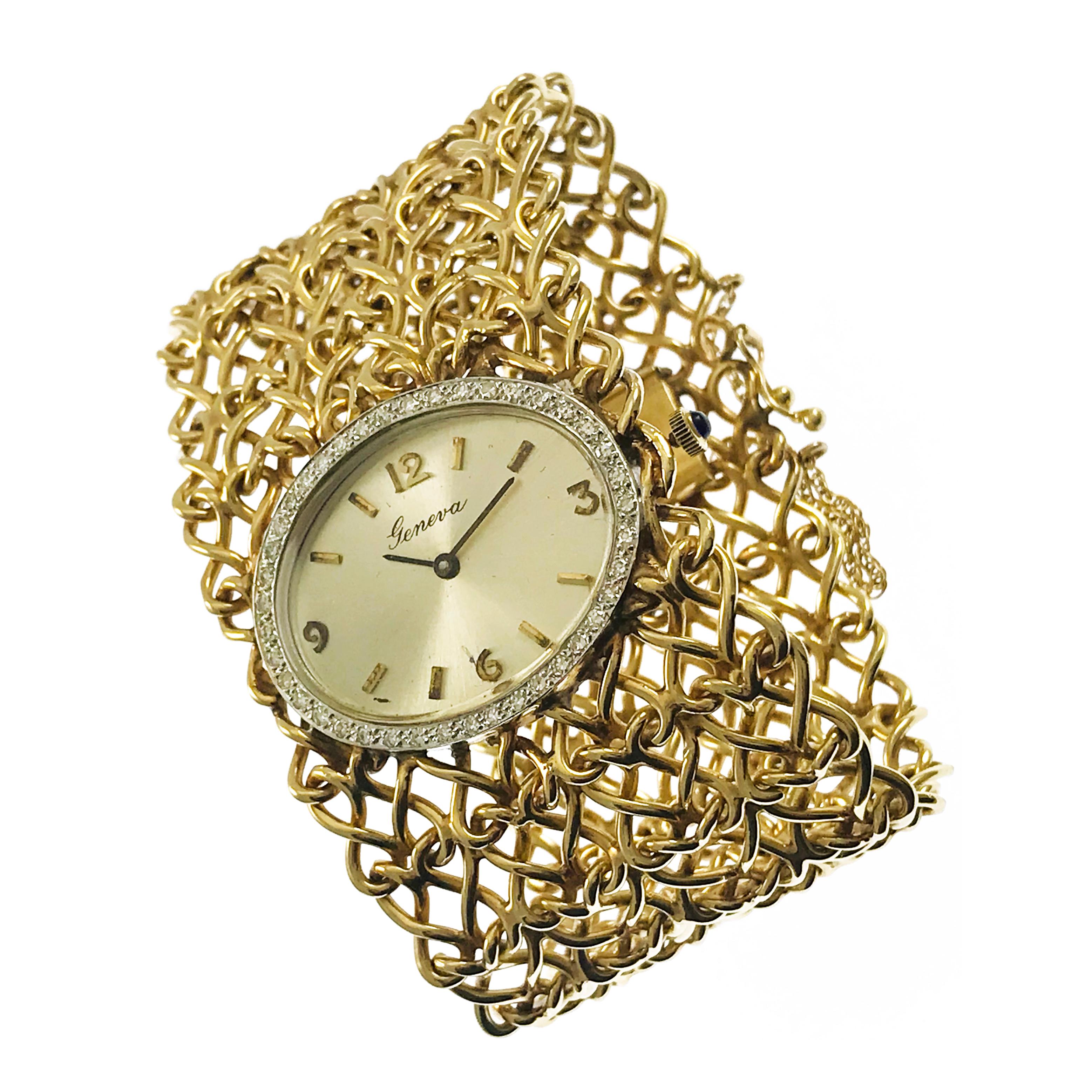 Ladies Geneva 14k Diamond Bracelet Watch, Circa 1970s. The dial is framed with forty-one round diamonds with black baton hour and minute hands. The single-cut diamonds are VS2 in clarity (G.I.A.) and H-I in color (G.I.A.). The diamonds are 1.5mm for