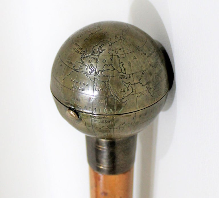 Ladies Globe Walking Stick Cane Which Opens to Compact with Mirror at