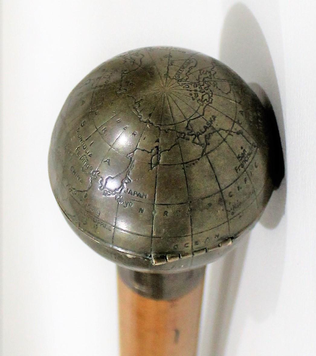 Ladies Globe Walking Stick Cane Which Opens to Compact with Mirror In Good Condition In Hamilton, Ontario