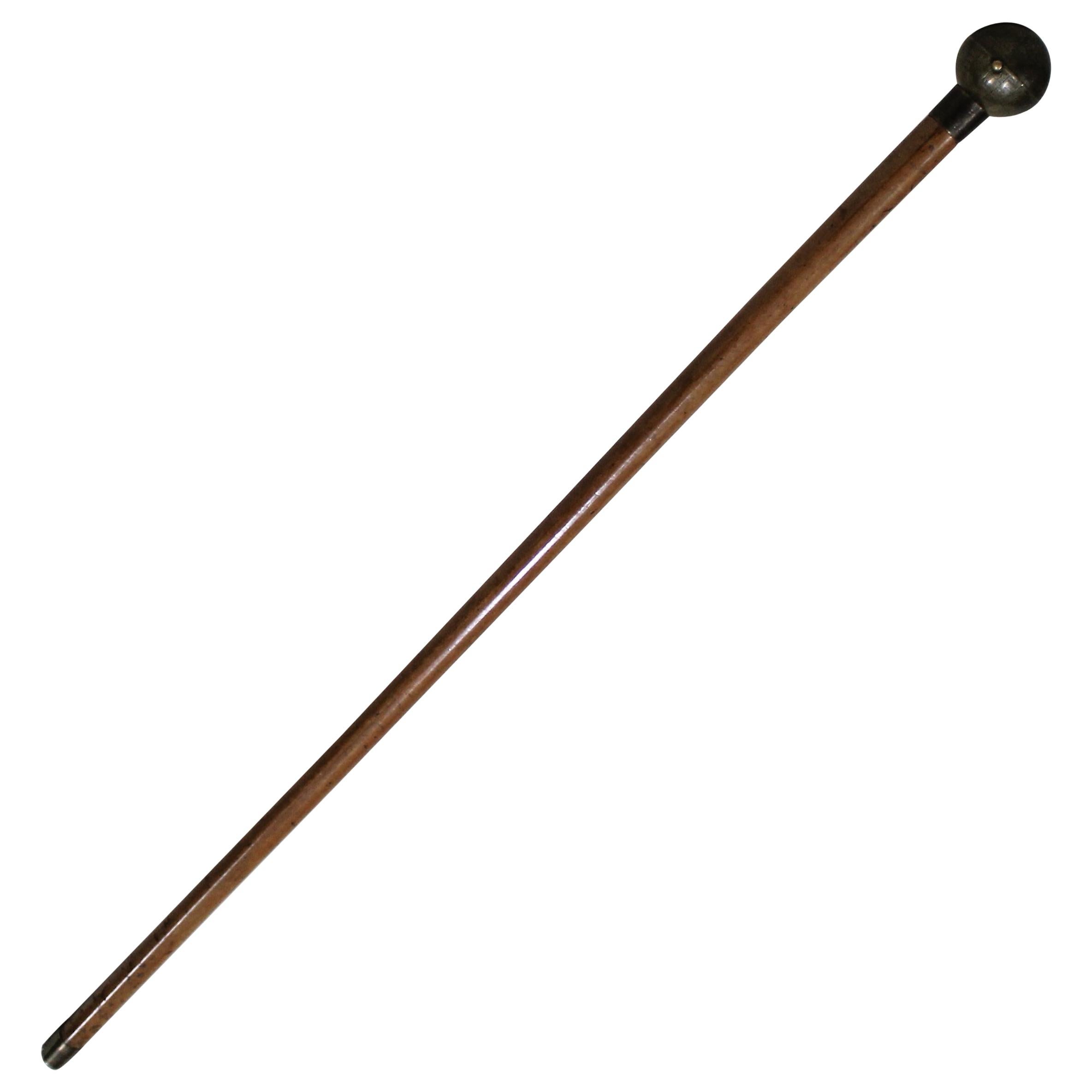 Ladies globe walking stick cane which opens to compact with mirror.