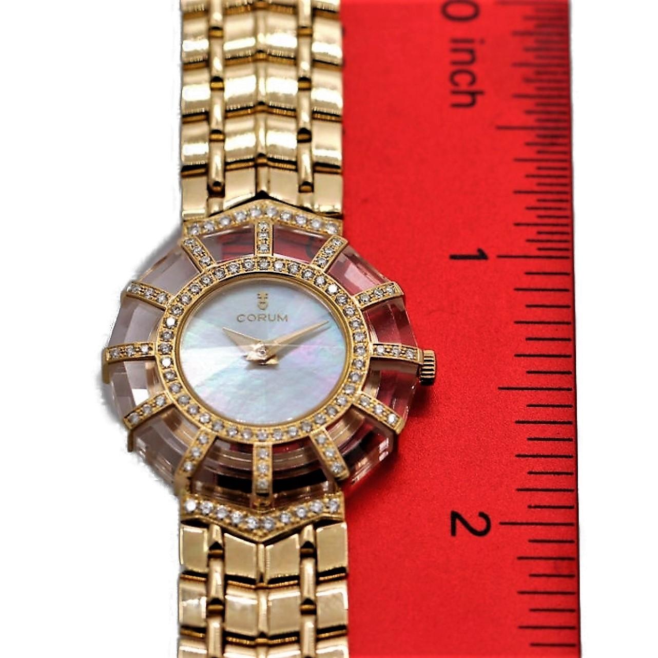Round Cut Ladies Gold Corum Watch with Diamond and Crystal Bezel and Mother of Pearl Dial