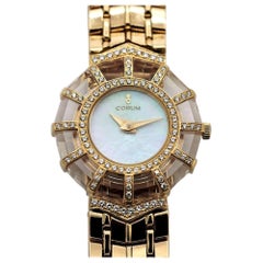 Ladies Gold Corum Watch with Diamond and Crystal Bezel and Mother of Pearl Dial