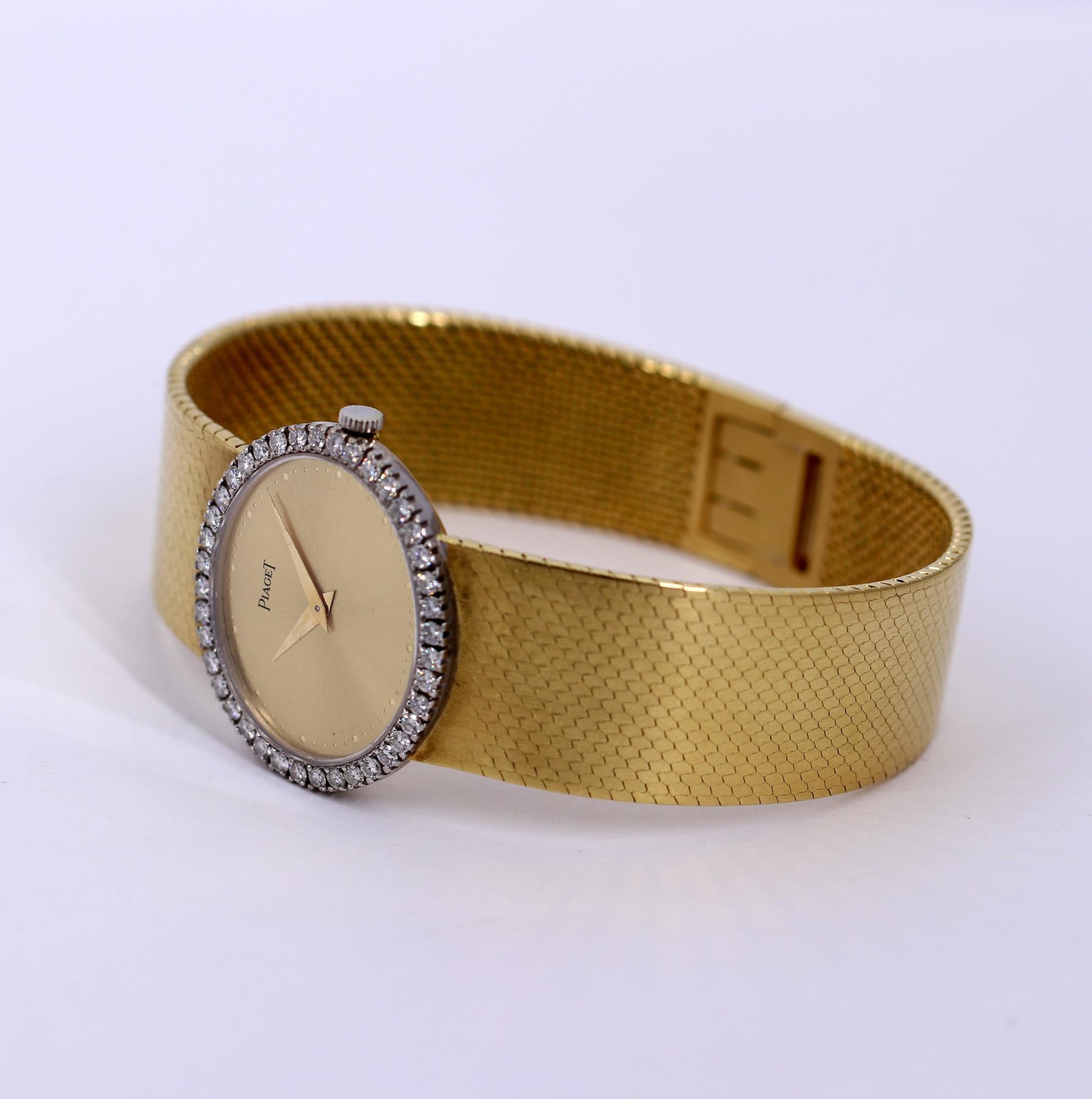 Ladies Gold Piaget Watch with Champagne Dial and Diamond Bezel In Good Condition In Palm Beach, FL