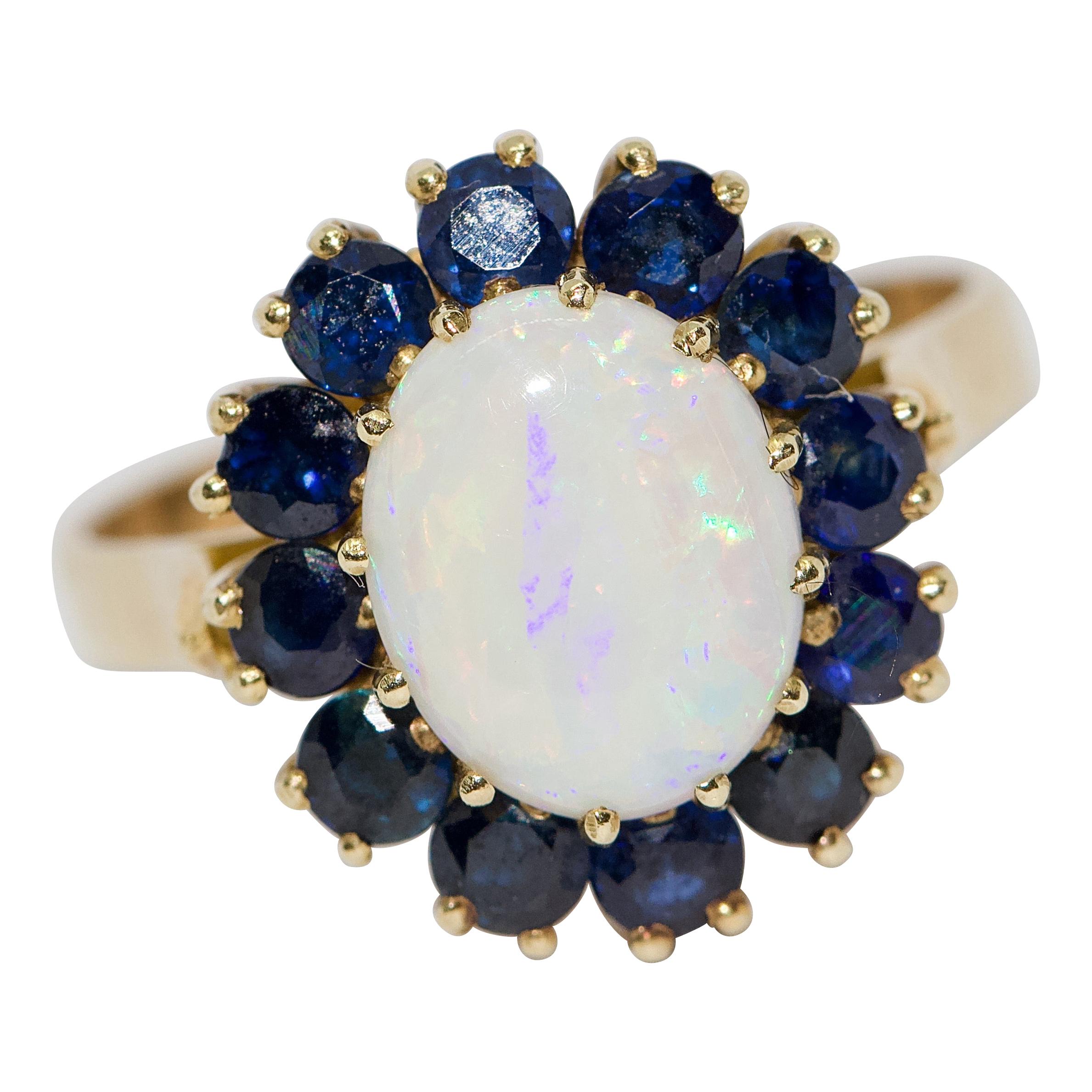 Damen-Goldring mit großem Opal und blauen Saphiren im Angebot