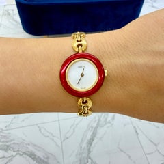 Ladies Gucci Cherry Red Bezel 26MM 11/12.2 Gold-Plated Gucci Puff Quartz Watch