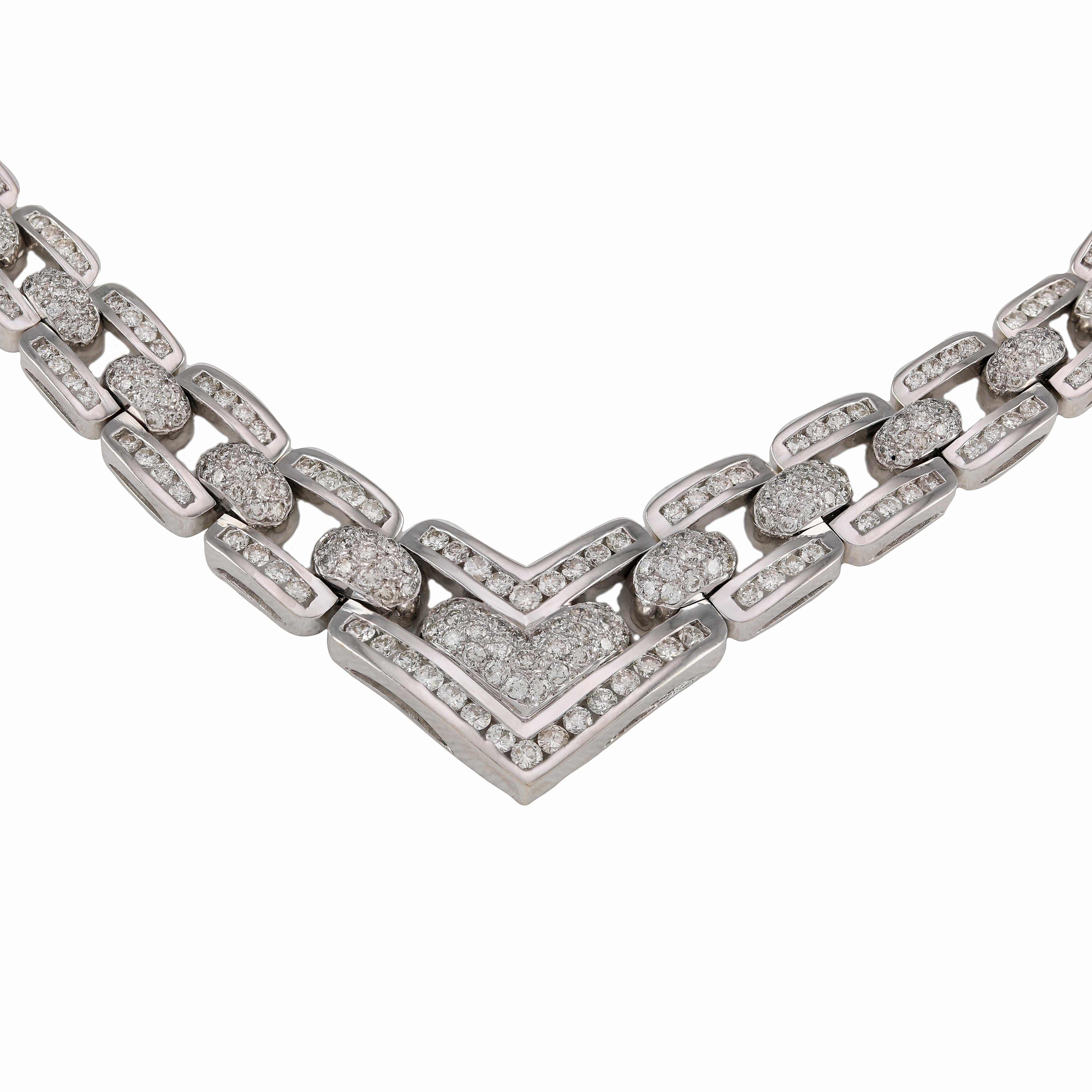 Ladies Heavy Link 8.00 Carat Pavé and Channel Set Diamond Necklace
Spectacular ultra high-end and very heavy diamond necklace fit for the red carpet, a queen, or the fabulous bride. This necklace is encrusted with 8.00 carats of diamonds and handset