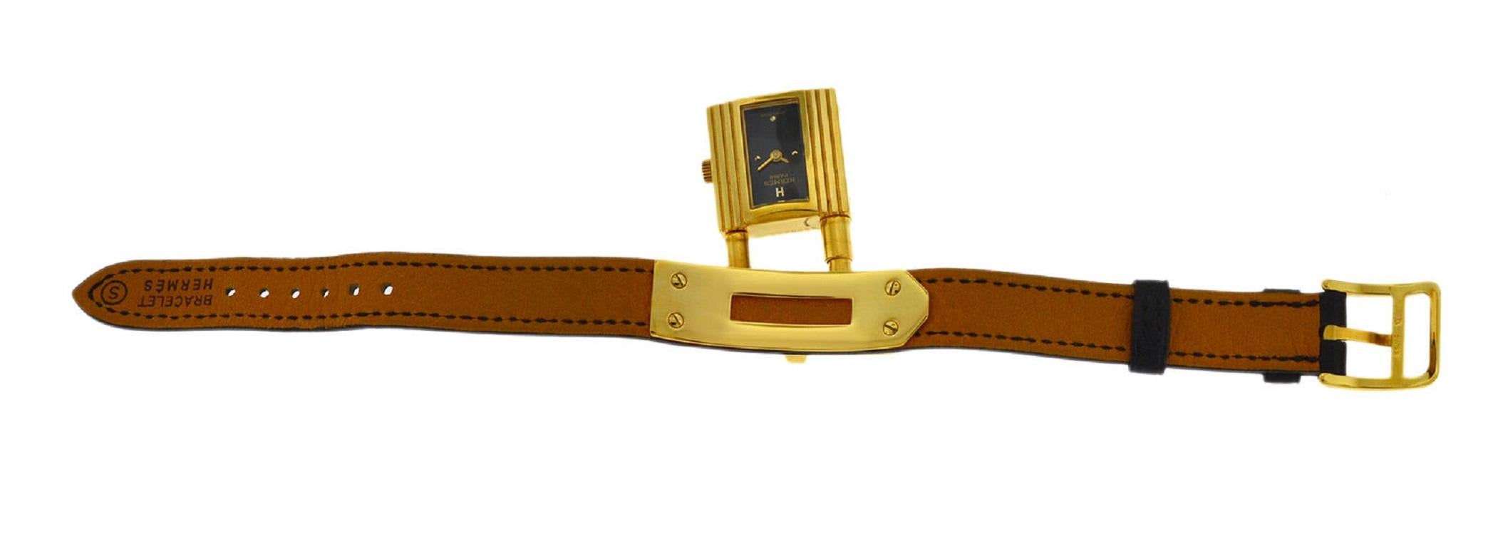 Ladies Hermes Kelly KE1.201 Gold Black Leather Belt Quartz Watch In Excellent Condition For Sale In New York, NY