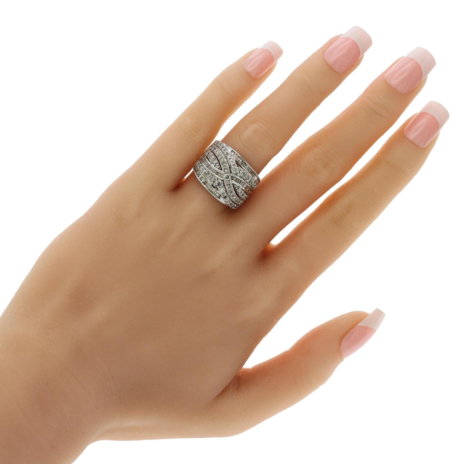 100% Authentic, 100% Customer Satisfaction

Top: 16 mm

Band Width: 2 mm

Metal: 14K White Gold

Size: 7

Hallmarks:  14K JWBR

Total Weight: 5.9 Grams

Stone:  2.04 CT Diamonds G  SI 

Condition: New

Estimated Retail Price: $3500

Stock Number: