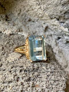 Ladies Light Blue Emerald cut Topaz 14 Karat Yellow Gold Ring