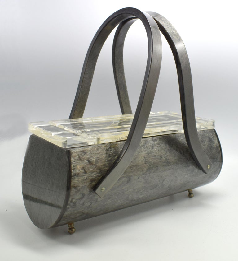 Rare Rialto New York (marked on hinge) Lucite marble gray and clear floral lid purse. It has two carrying handles and is in good condition for its age. The lid has a very rare etched floral pattern. It still has its 4 metal feet and original marked