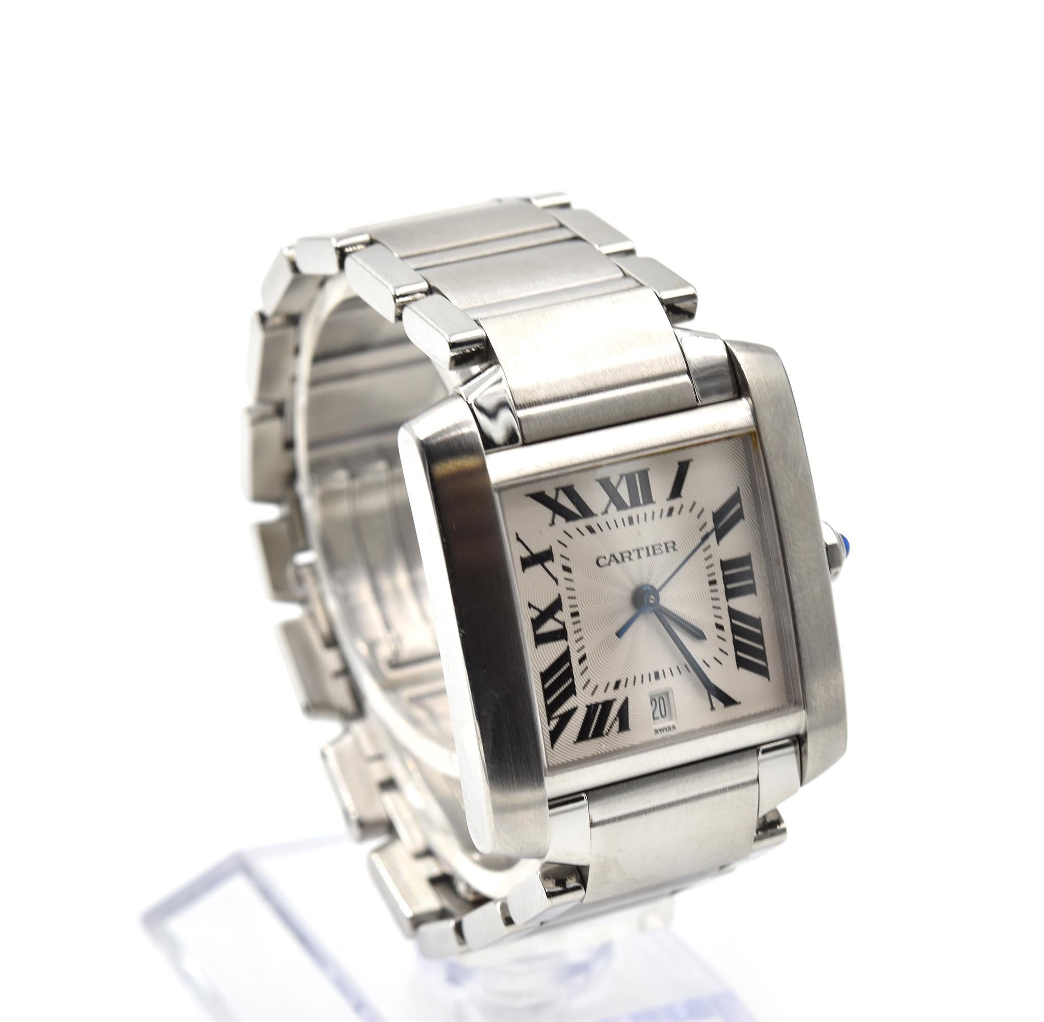 Movement: automatic
Function: hours, minutes, seconds, date
Case: square 36.5mm x 28.15mm stainless steel case with sapphire crystal, blue spinel pull/push crown
Band: stainless steel Cartier bracelet with folding deployment clasp, bracelet fit for
