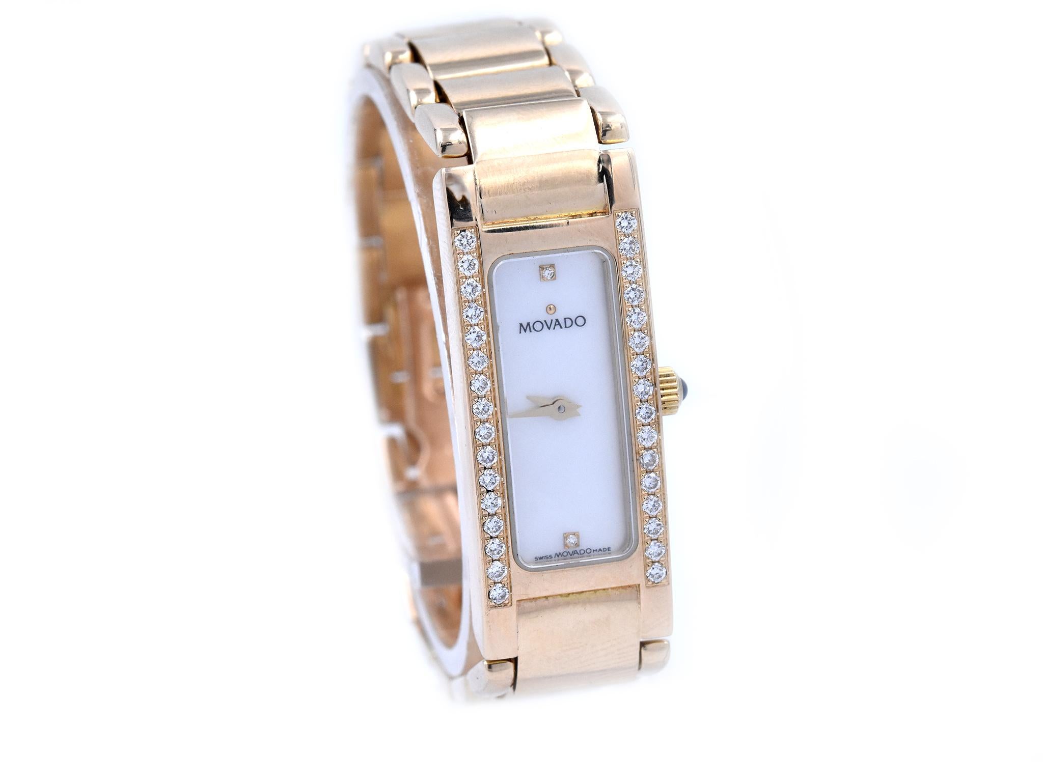Movement: quartz
Function: hours, minutes
Case: 13.65mm x 33.40mm yellow gold case, diamond bezel = 0.35cttw, push/pull crown, water resistant
Dial: mother-of-pearl dial with gold hands, diamond hour markers at 12 and 6 o’clock
Bracelet: 14k yellow