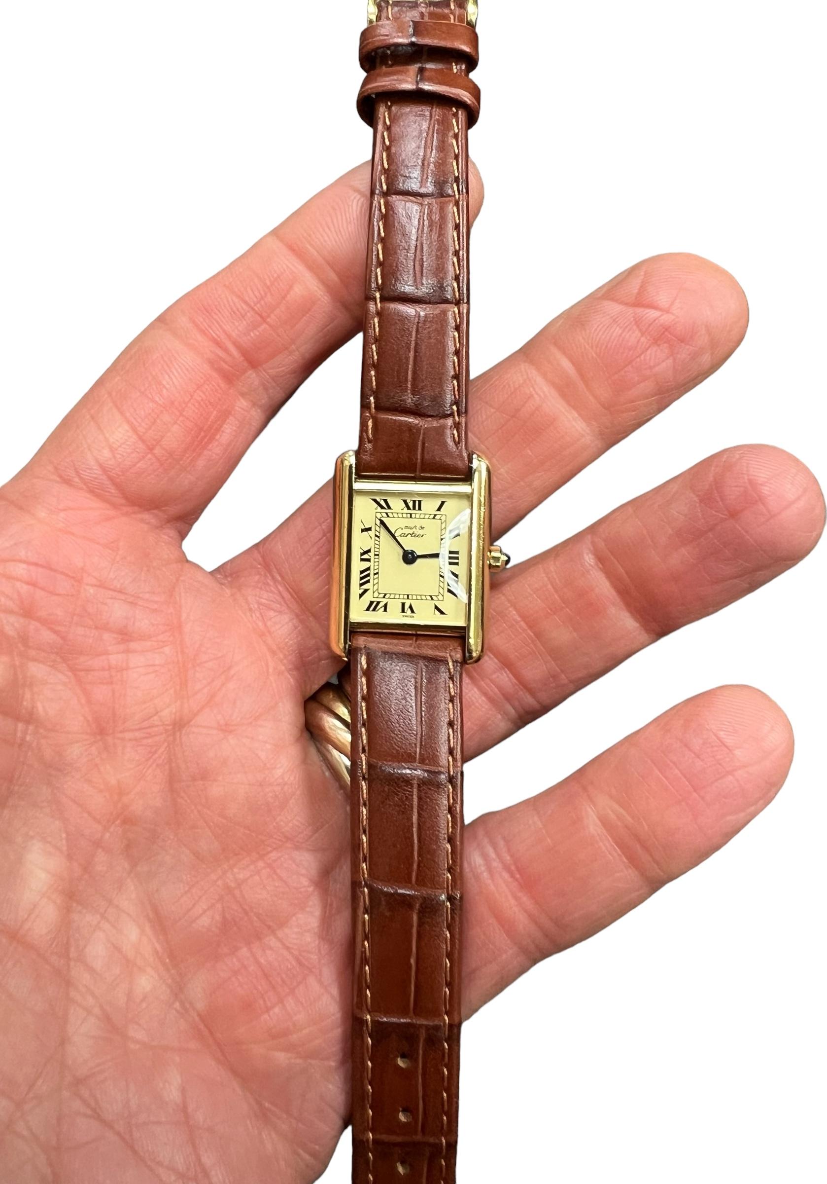 Ladies Must de Cartier quartz vermeil tank watch, circa 1990s

SPECIFICATIONS:

 MOVEMENT: Quartz

 CASE Vermeil

 STRAP: Leather strap (not a Cartier strap)

 MEASUREMENTS: Approximately  1-1/16