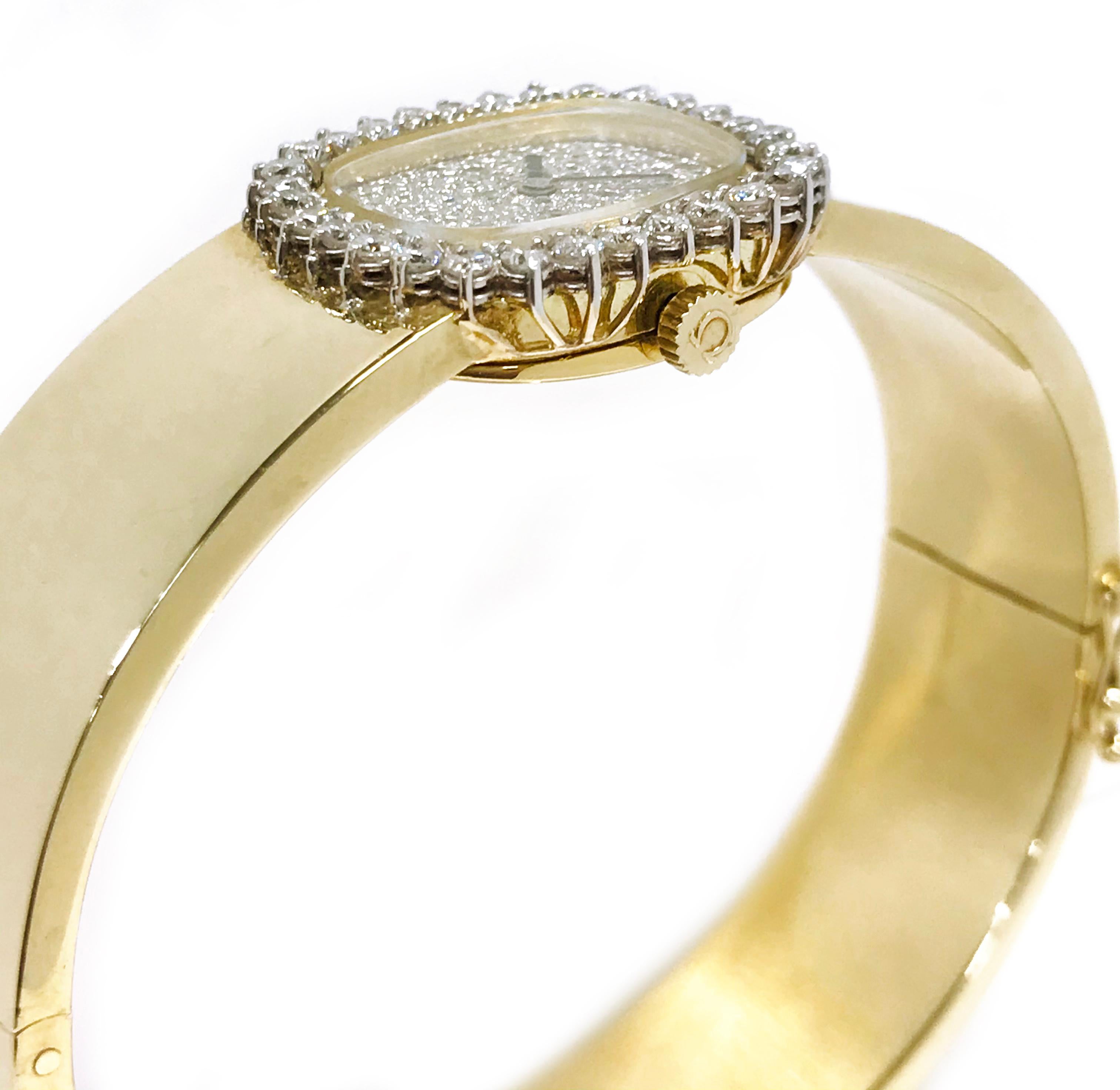 Round Cut Omega Ladies Yellow Gold Diamond Bangle Watch For Sale