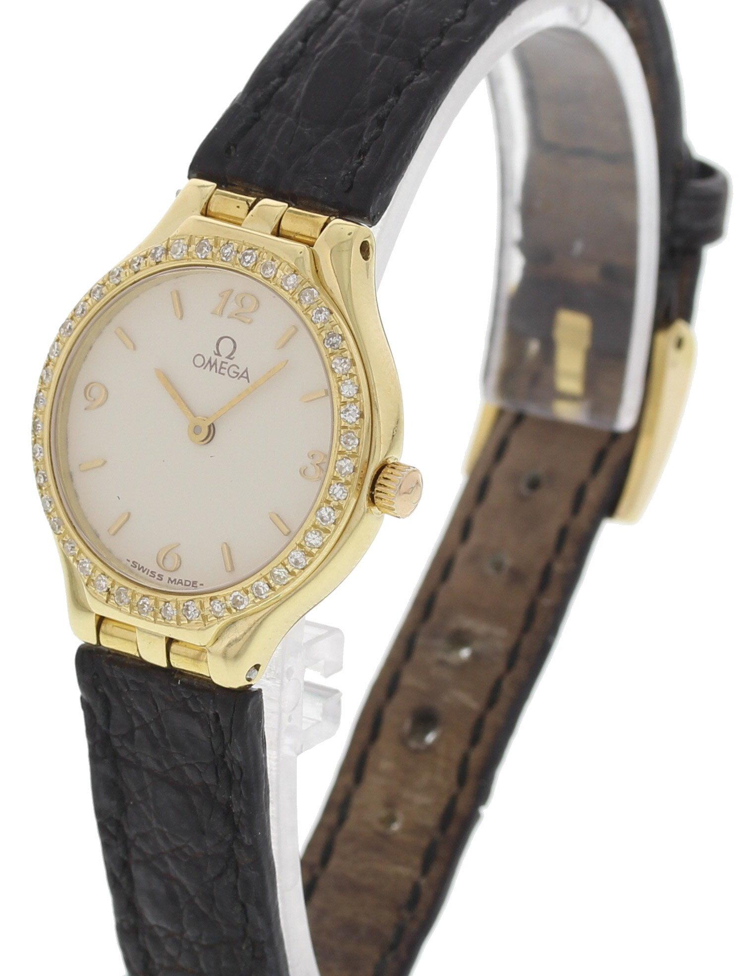 A ladies Omega 18k yellow gold diamond watch with an adjustable black leather band. It has a 23 mm 18k yellow gold case. This is a quartz: battery watch with an analog display.
