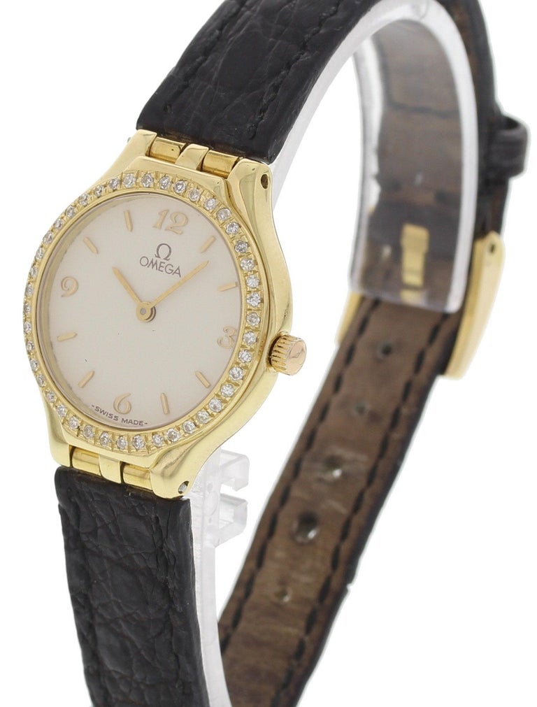 Ladies Omega 18 Karat Yellow Gold Diamond Bezel Watch For Sale at 1stDibs