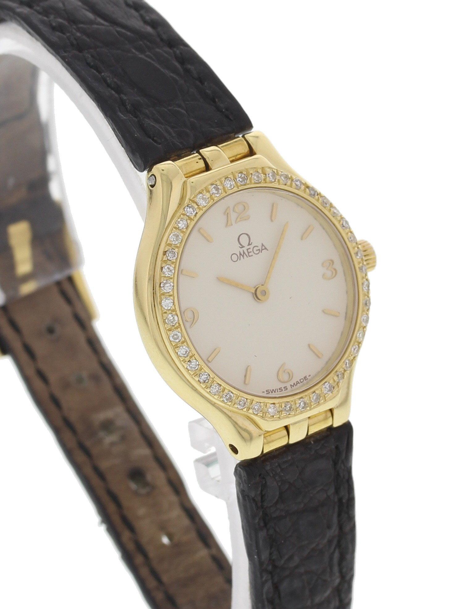 Ladies Omega 18 Karat Yellow Gold Diamond Bezel Watch In Good Condition For Sale In New York, NY
