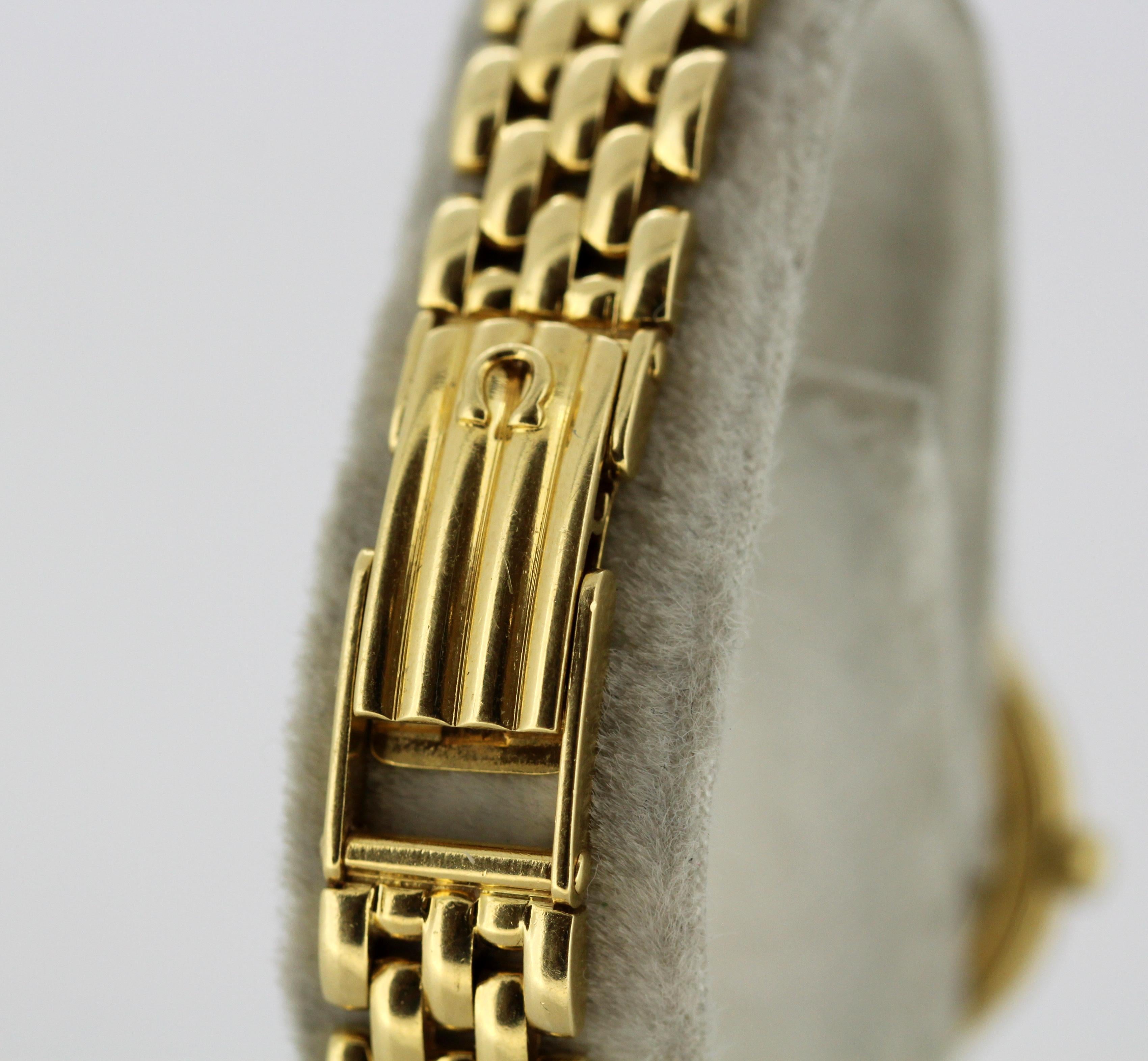 Ladies Omega wristwatch set in full 18k gold, diamond bezel & hour markers 8