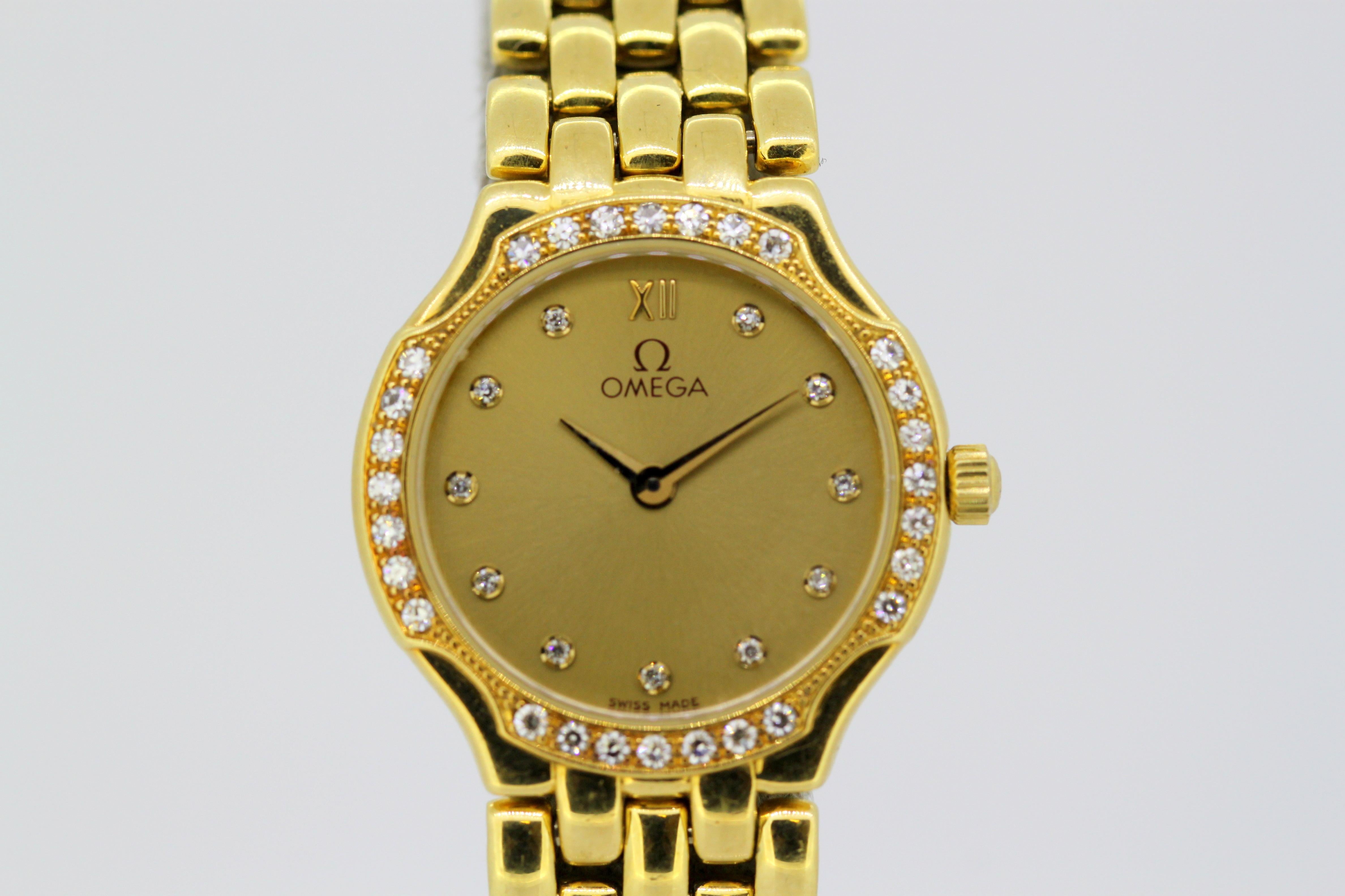 Ladies Omega wristwatch set in full 18k gold, diamond bezel & hour markers 1