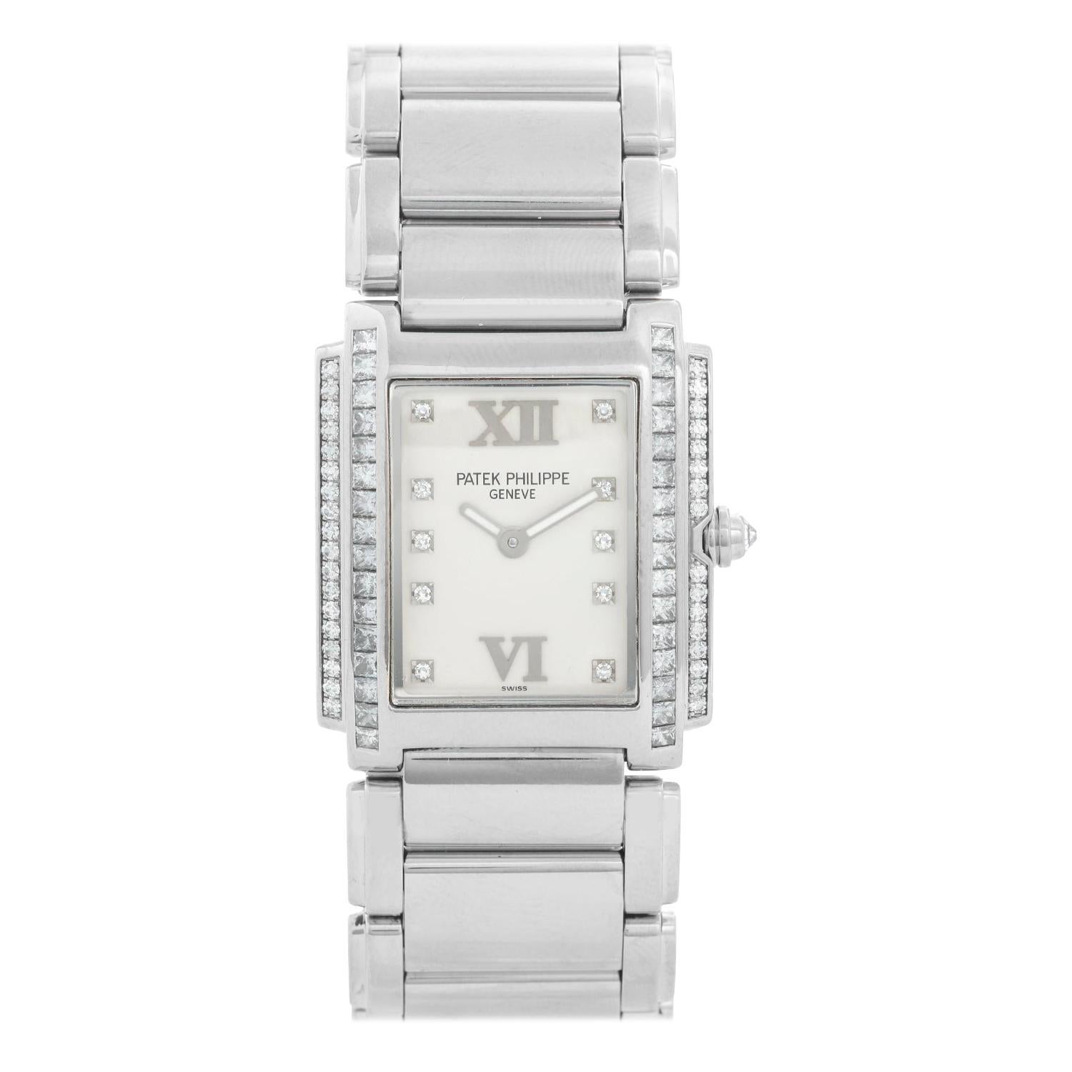 Ladies Patek Philippe Twenty-4 18 Karat White Gold and Diamond Watch 4910/20G