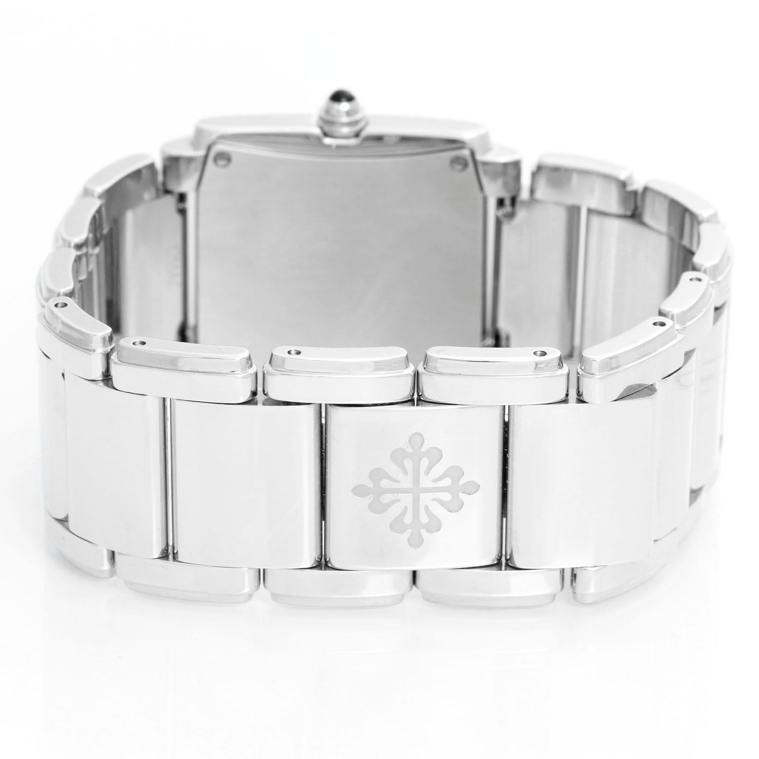 Ladies Patek Philippe Twenty-4 Watch Stainless Steel Blue Dial Watch 4910/10A In Excellent Condition In Dallas, TX