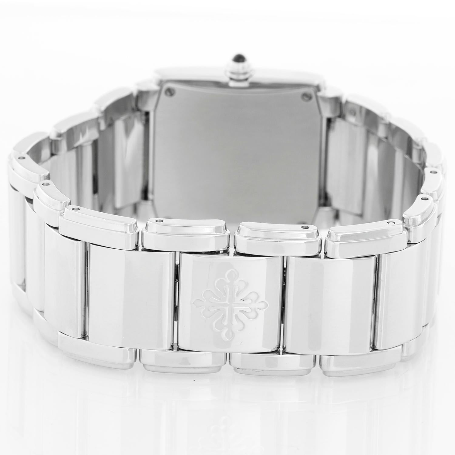 Ladies Patek Philippe Twenty-4 Watch Stainless Steel White Dial Watch 4910/10A In Excellent Condition In Dallas, TX