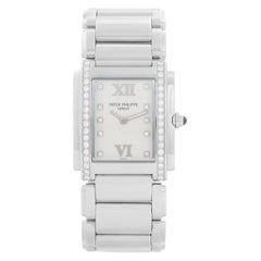 Montre Patek Philippe Twenty-4 pour femmes - acier inoxydable - cadran blanc 4910/10A