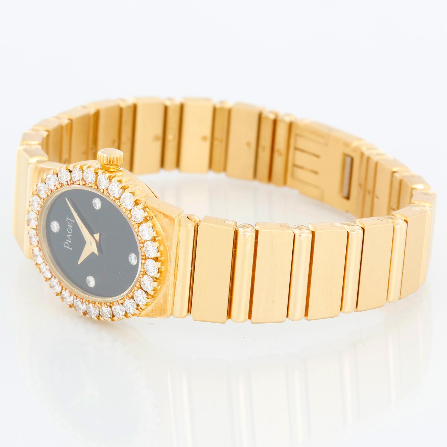Ladies Piaget Polo 18K Yellow Gold  Watch - Quartz. 18k yellow gold case with  Piaget Diamond  bezel ( 19mm ). Black Onyx  dial with diamond hour markers. 18k yellow gold bracelet with deployant clasp; will fit a 5 3/4 inch wrist . Pre-owned with
