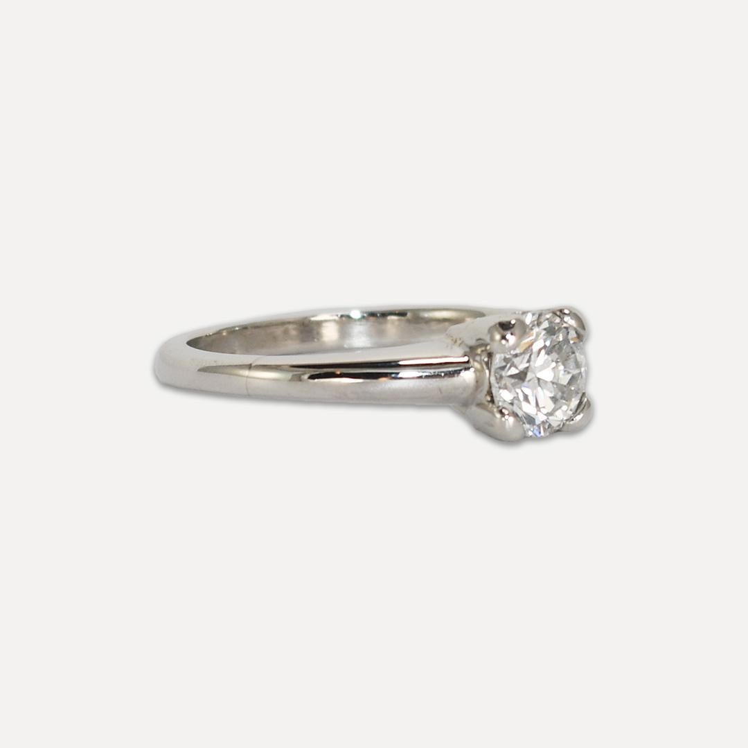 Ladies' diamond solitaire engagement ring.
Tests platinum and weighs 4 grams gross weight.
The diamond is a round brilliant cut, H to I color, Vs clarity, .65 carats, good cut.
Ring size is 4 3/4 and can be sized up to 6 for an extra fee.
Looks