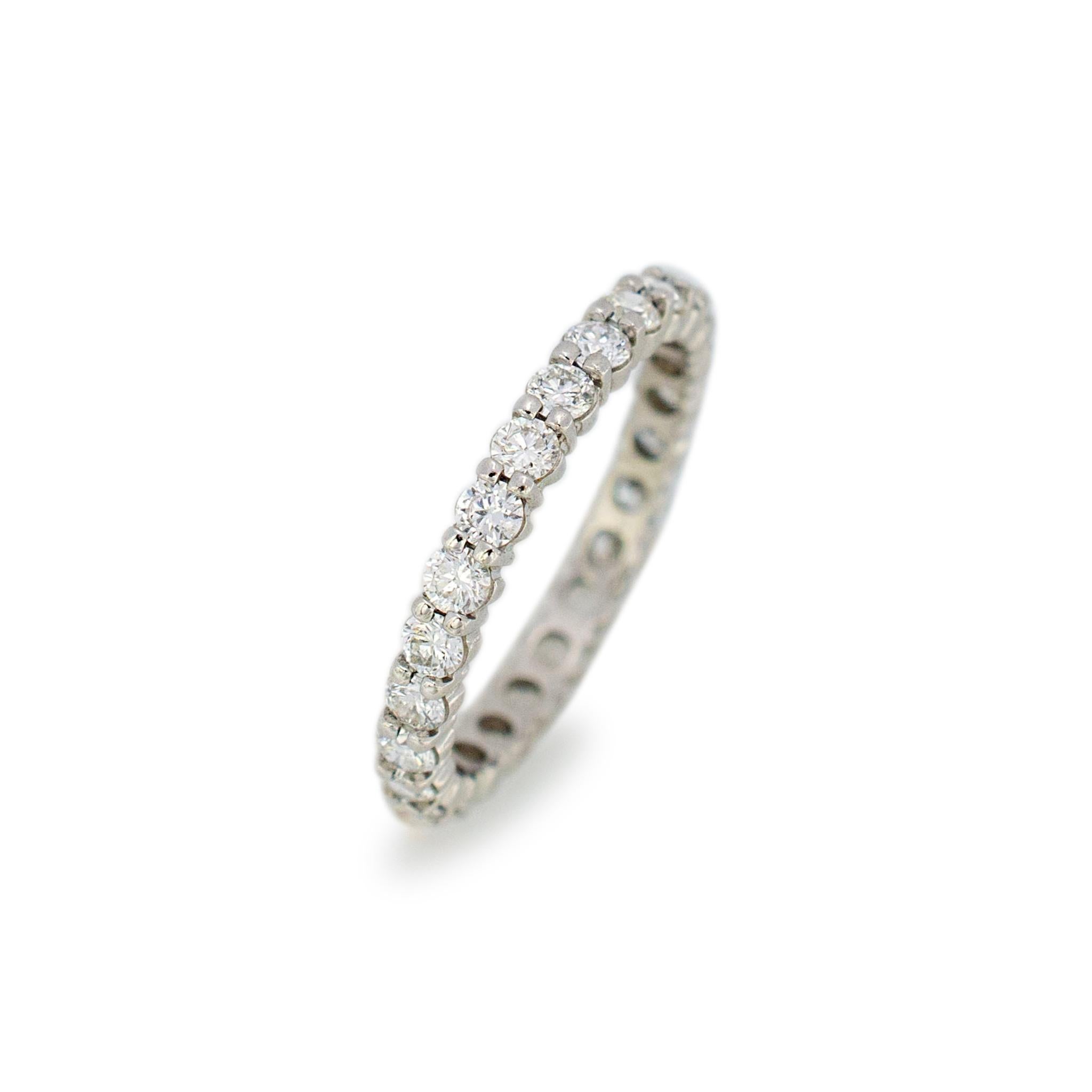 Gender: Ladies

Metal Type: Platinum 

Size: 5

Shank Maximum Width: 2.50 mm

Weight: 2.12 grams

Ladies platinum diamond eternity band with a half-round shank.

Pre-owned in excellent condition. Might shows minor signs of wear.

Shared-Prong Set in
