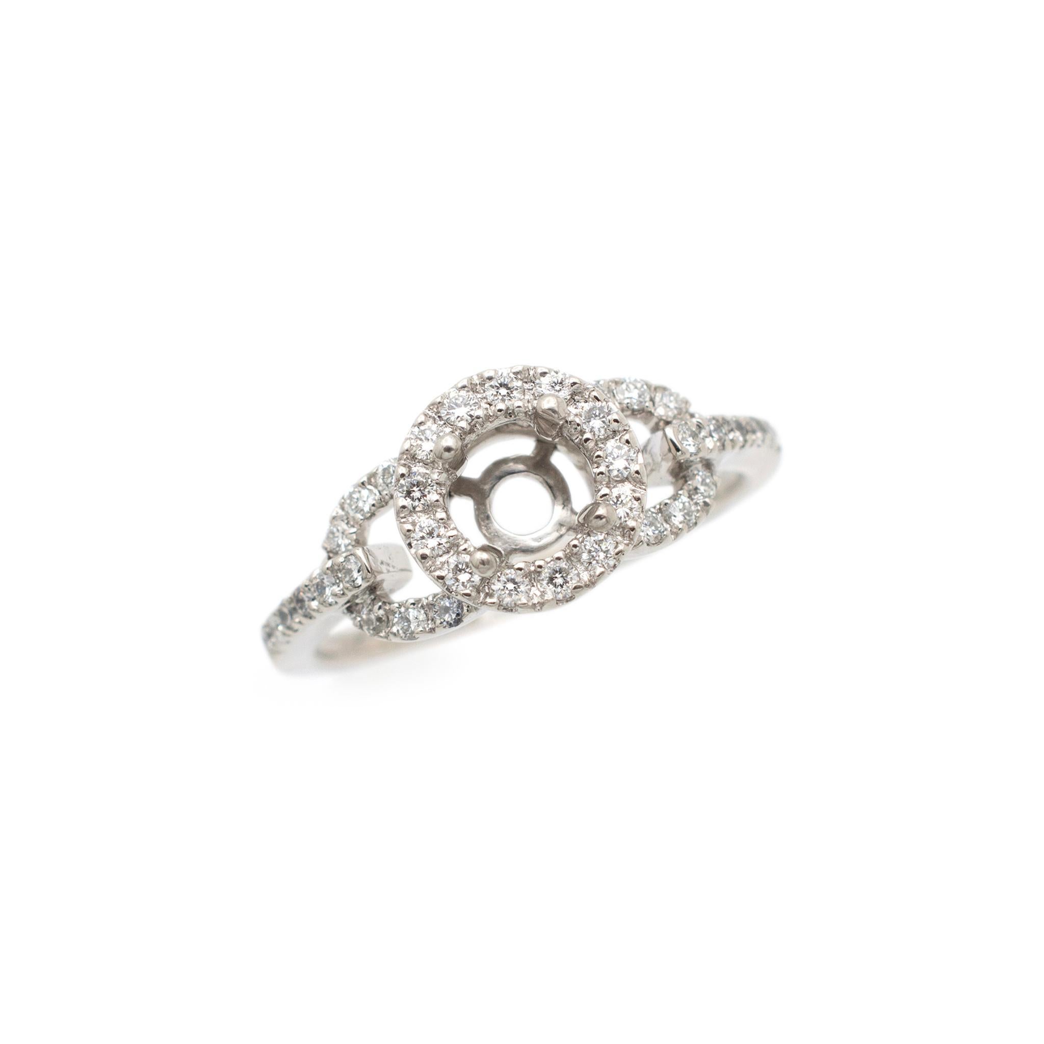 Gender: Ladies

Metal Type: Platinum

Size: 9

Shank Maximum Width: 1.75 mm

Weight: 6.60 grams

Ladies platinum diamond halo accented semi-mount engagement ring with a half round shank. The metal was tested and determined to be platinum.
The