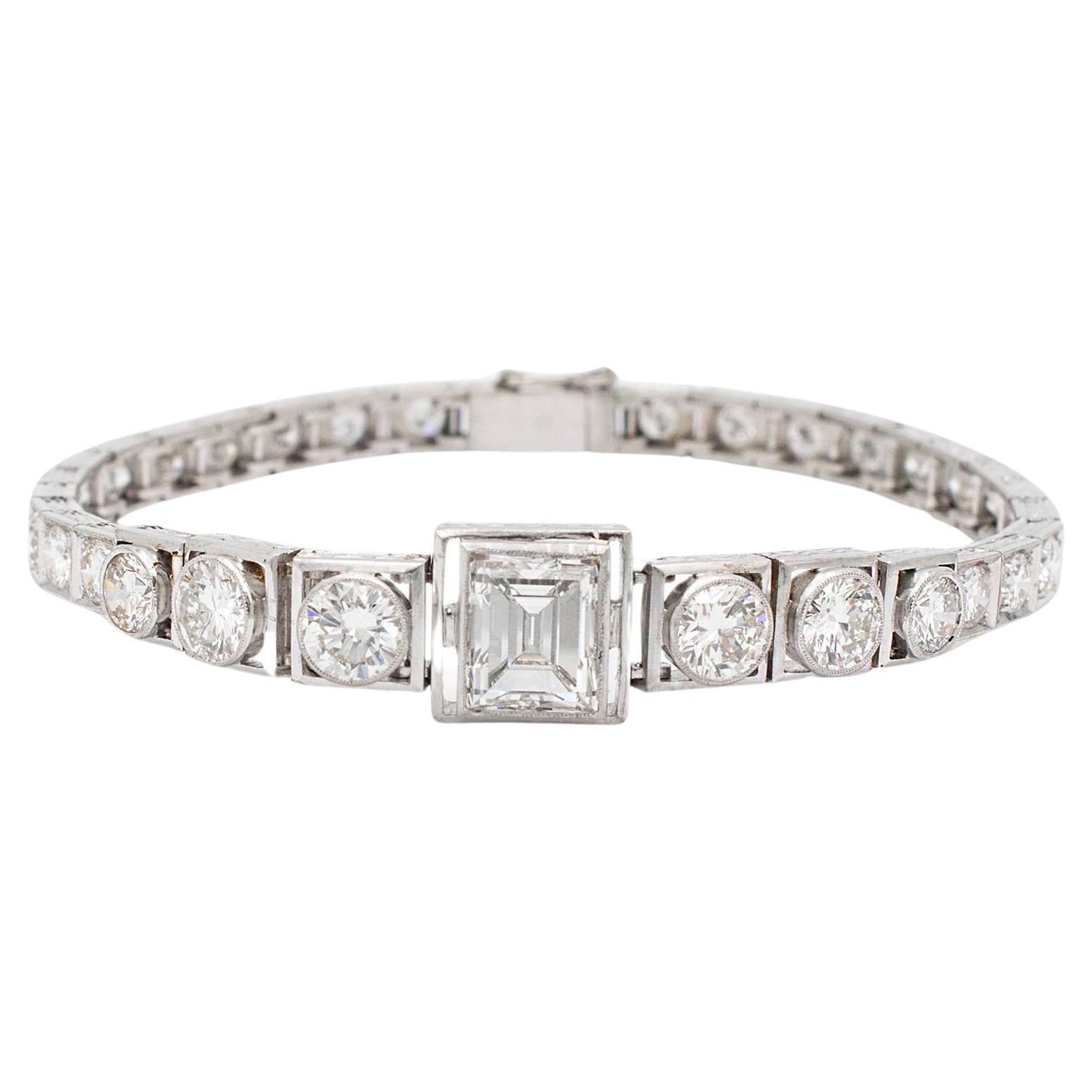 Ladies Platinum Vintage Emerald 8.60CT. Diamond Link Tennis Statement Bracelet For Sale