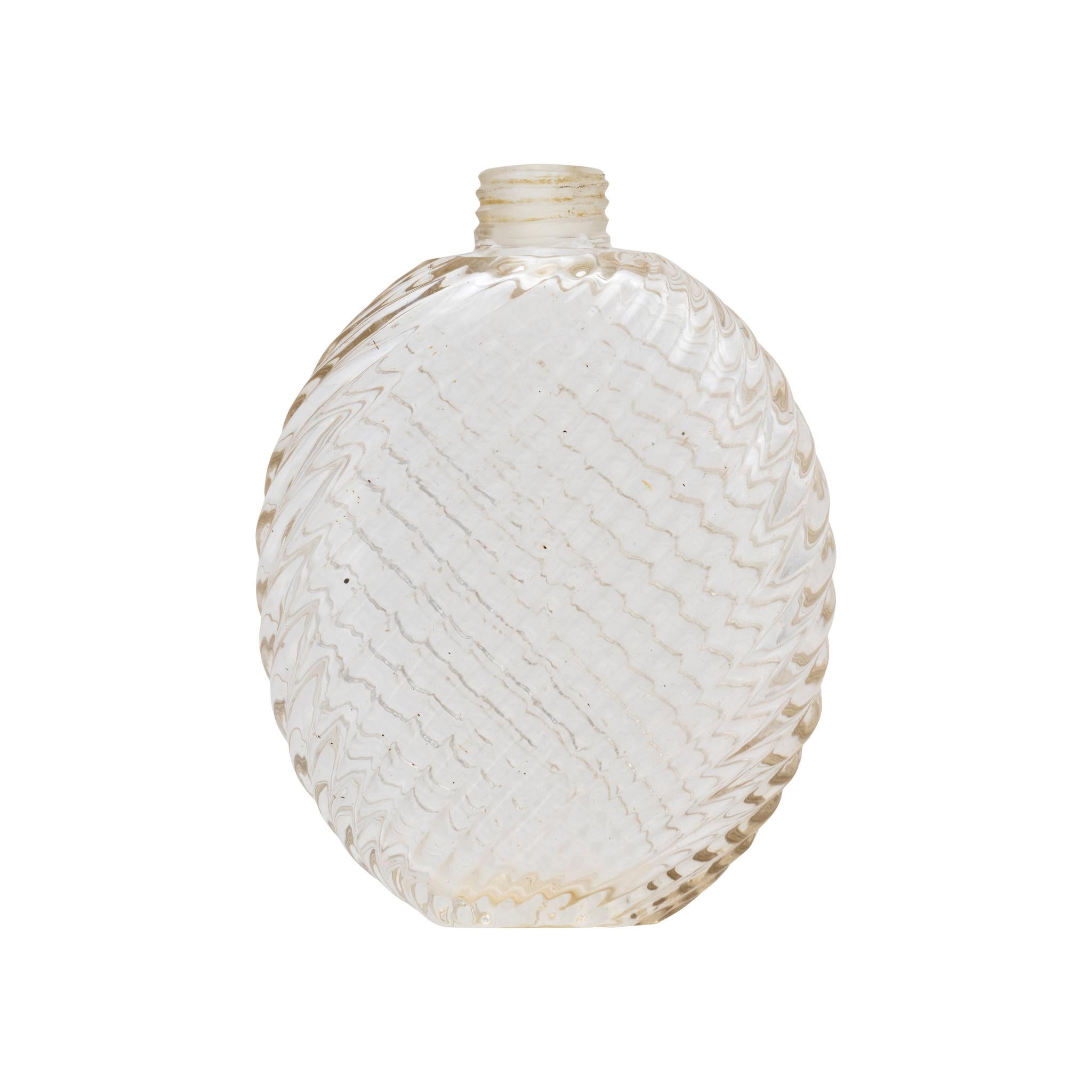 Ladies pressed glass flask with sterling silver cap. Flask itself is made fully of glass with flat bottom. An elegant swirling design is shaped into the glass using a manual pressing method to eliminate any seams. The design wraps completely around