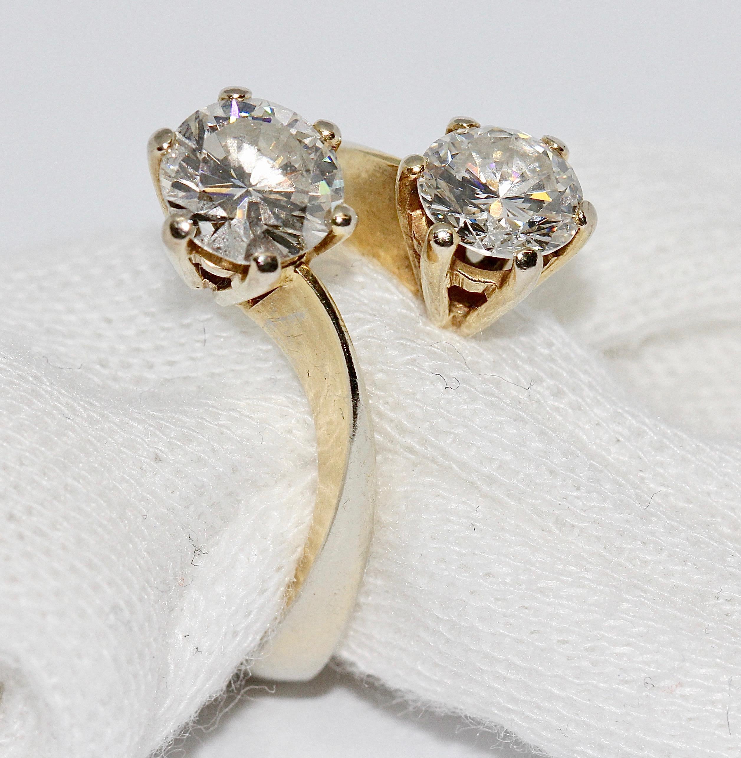 Luxurious Ladies Ring set with Two Large Diamond Solitaires. 18 Karat Gold.

Clarity VVS2, color Top Wesselton. Each approx. 0.95 ct. and 1.15 ct.

We can adjust the ring to any desired ring size.

Including certificate of authenticity.