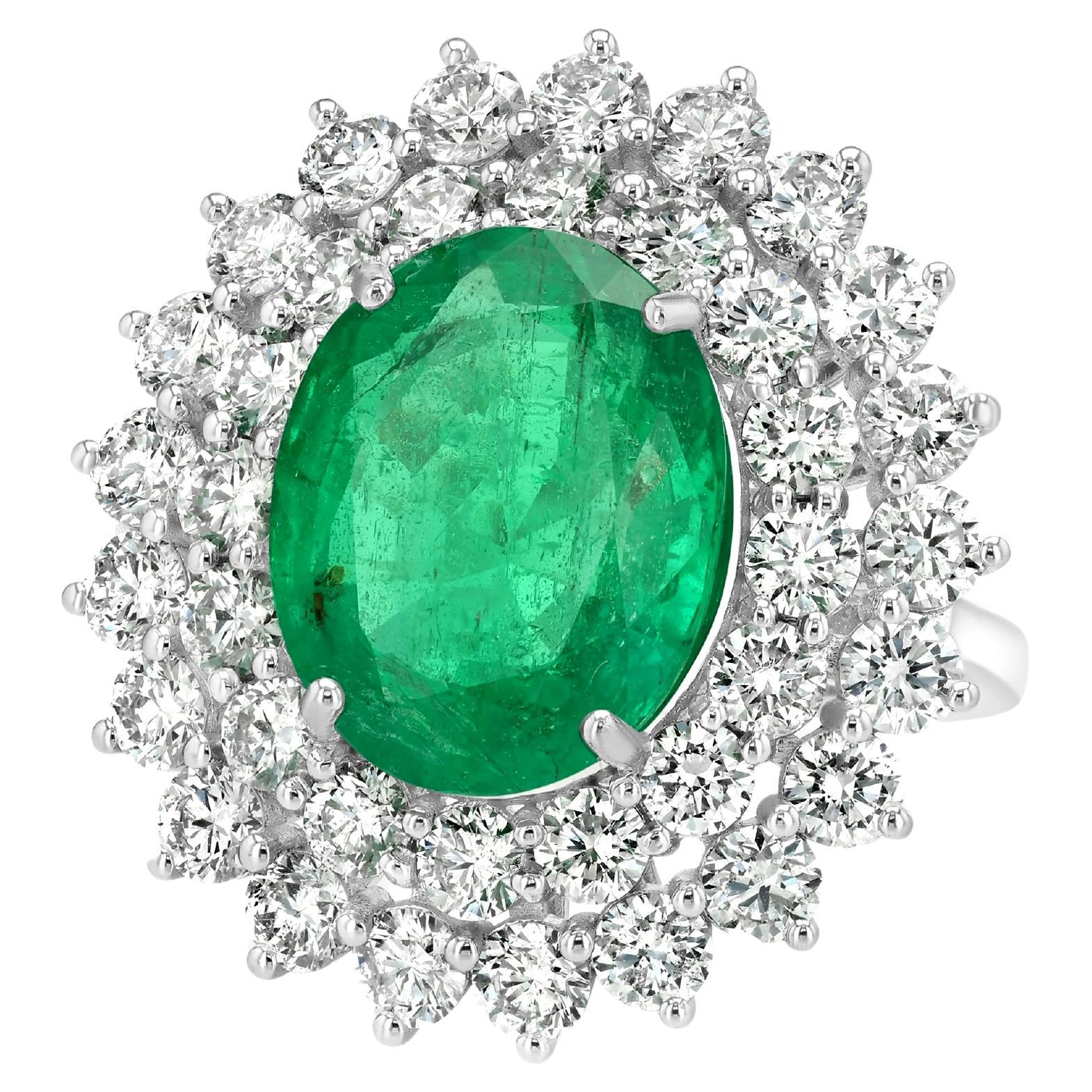 Anello da donna con diamanti e smeraldo