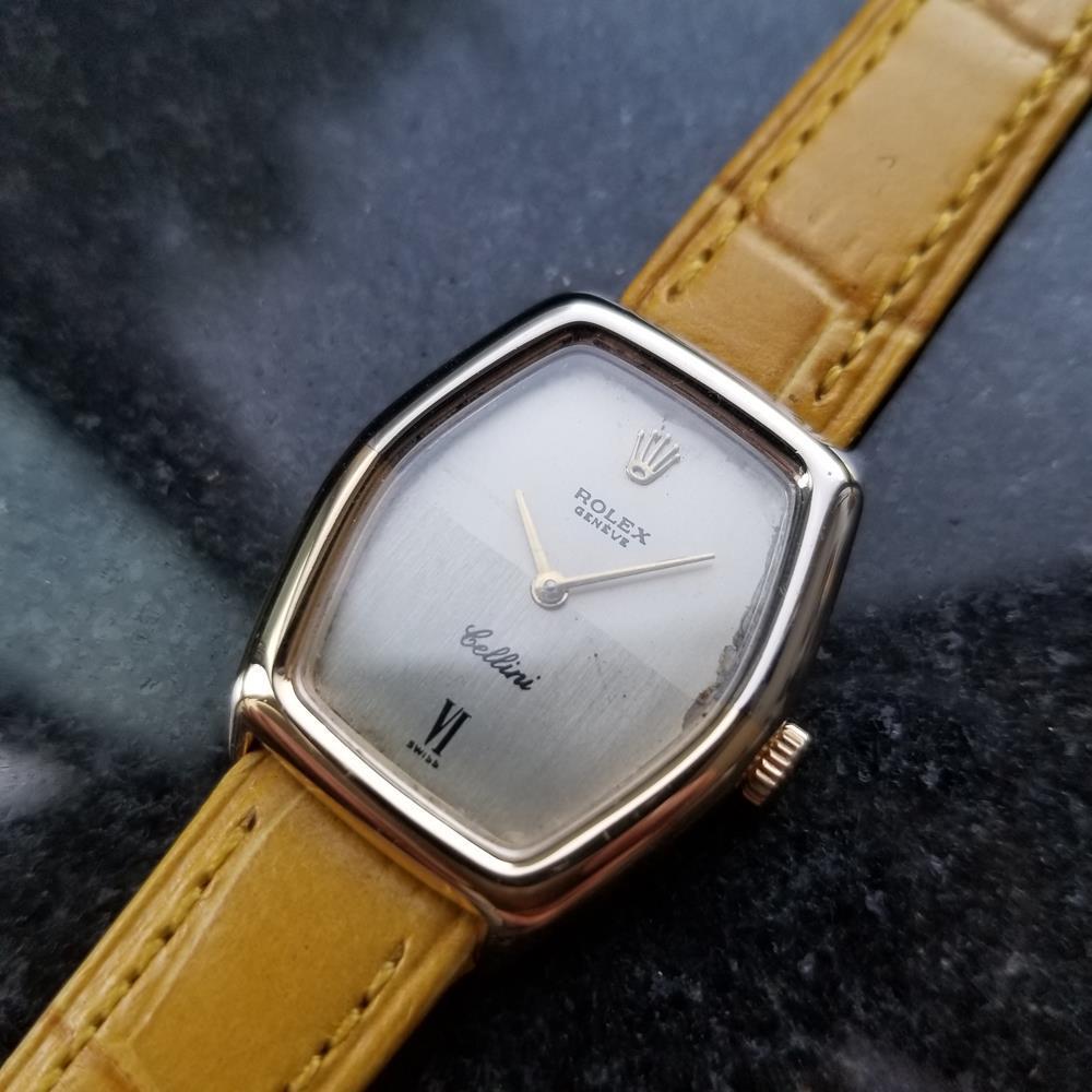 Timeless luxury, ladies 18k white and yellow gold Rolex Cellini Geneve manual wind dress watch, c.1970s. Verified authentic by a master watchmaker. Gorgeous vintage Rolex signed golden dial, applied Rolex crown at the 12, Roman numeral 6, gold