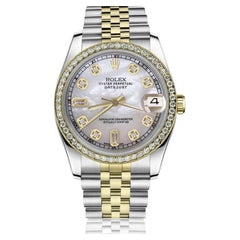 Rolex Montre Datejust vintage pour femme avec lunette en diamant bicolore et bracelet blanc 69173