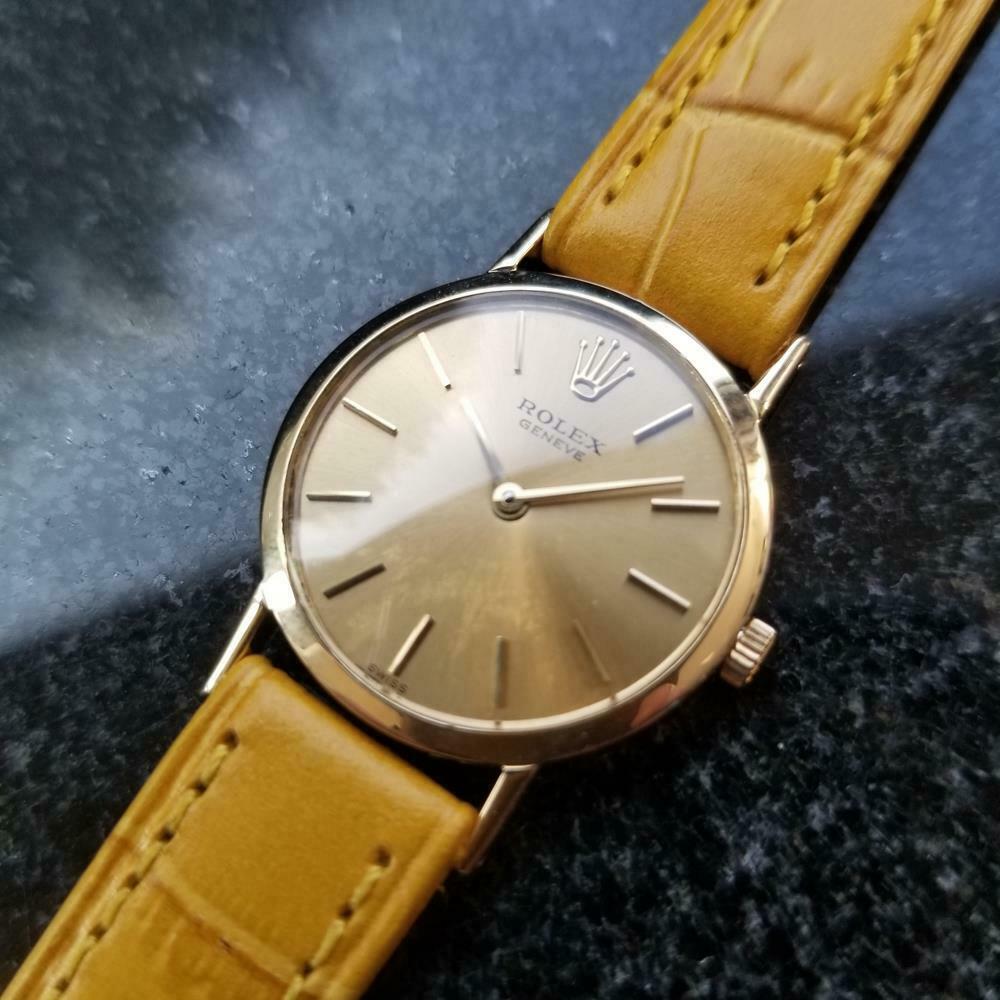 Charming luxury, ladies 18k yellow gold Rolex Cellini Geneve ref.3600 manual wind dress watch, c.1970s. Verified authentic by a master watchmaker. Gorgeous vintage Rolex signed golden dial, aged naturally, applied Rolex crown at the 12, applied