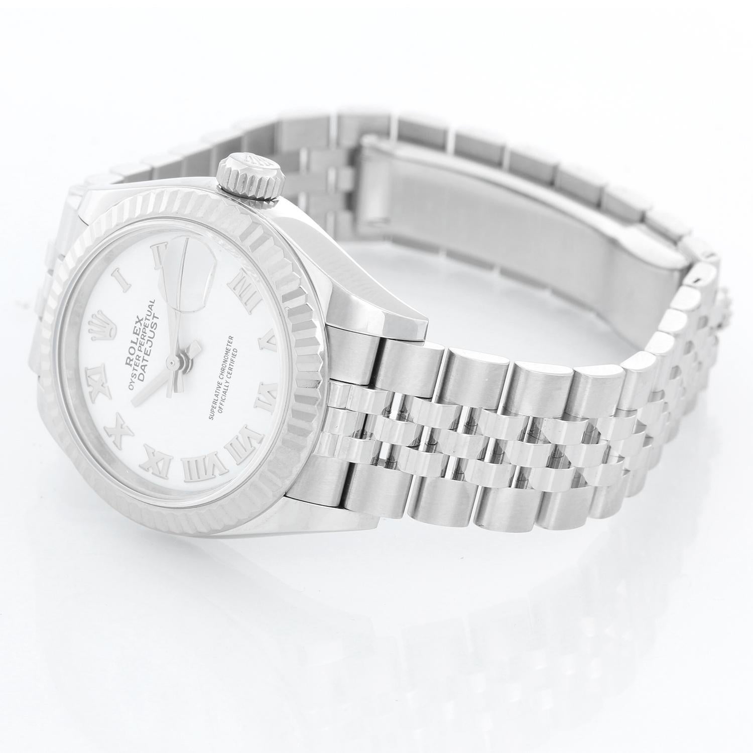 Ladies Rolex Datejust 28mm Stainless Steel White Dial 279174 - Automatic winding, 31 jewels, Quickset date, sapphire crystal. Stainless Steel with fluted bezel ( 28 mm). White dial with Roman numerals. Stainless Steel jubilee bracelet. Pre-owned