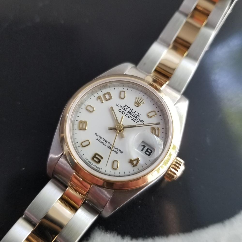 Timeless luxury, Ladies 18k gold & stainless steel Rolex Oyster Perpetual Datejust automatic, c.2002, all original. Verified authentic by a master watchmaker. Gorgeous Rolex signed white dial, applied Arabic numeral and indice hour markers, gilt