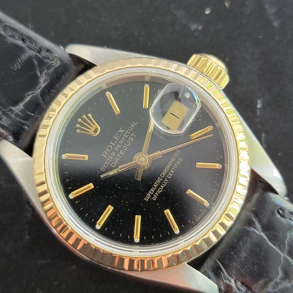 Timeless luxury, Ladies 18k gold & SS Rolex Oyster Datejust automatic dress watch with original box, tag and guarantee paper, c.1987. Verified authentic by a master watchmaker. Gorgeous Rolex signed black speckled dial, applied gold indice hour